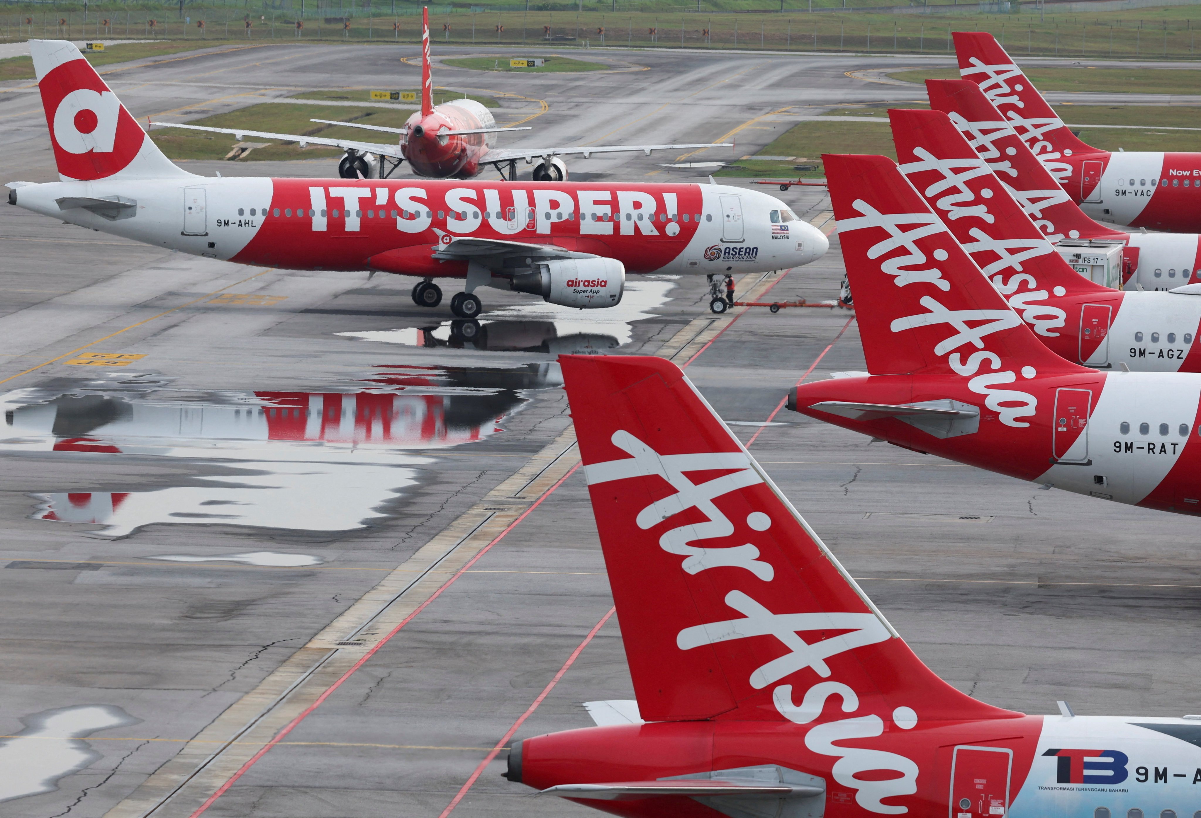 AirAsia planes stand on the tarmac at Kuala Lumpur International Airport in Malaysia. Photo: Reuters