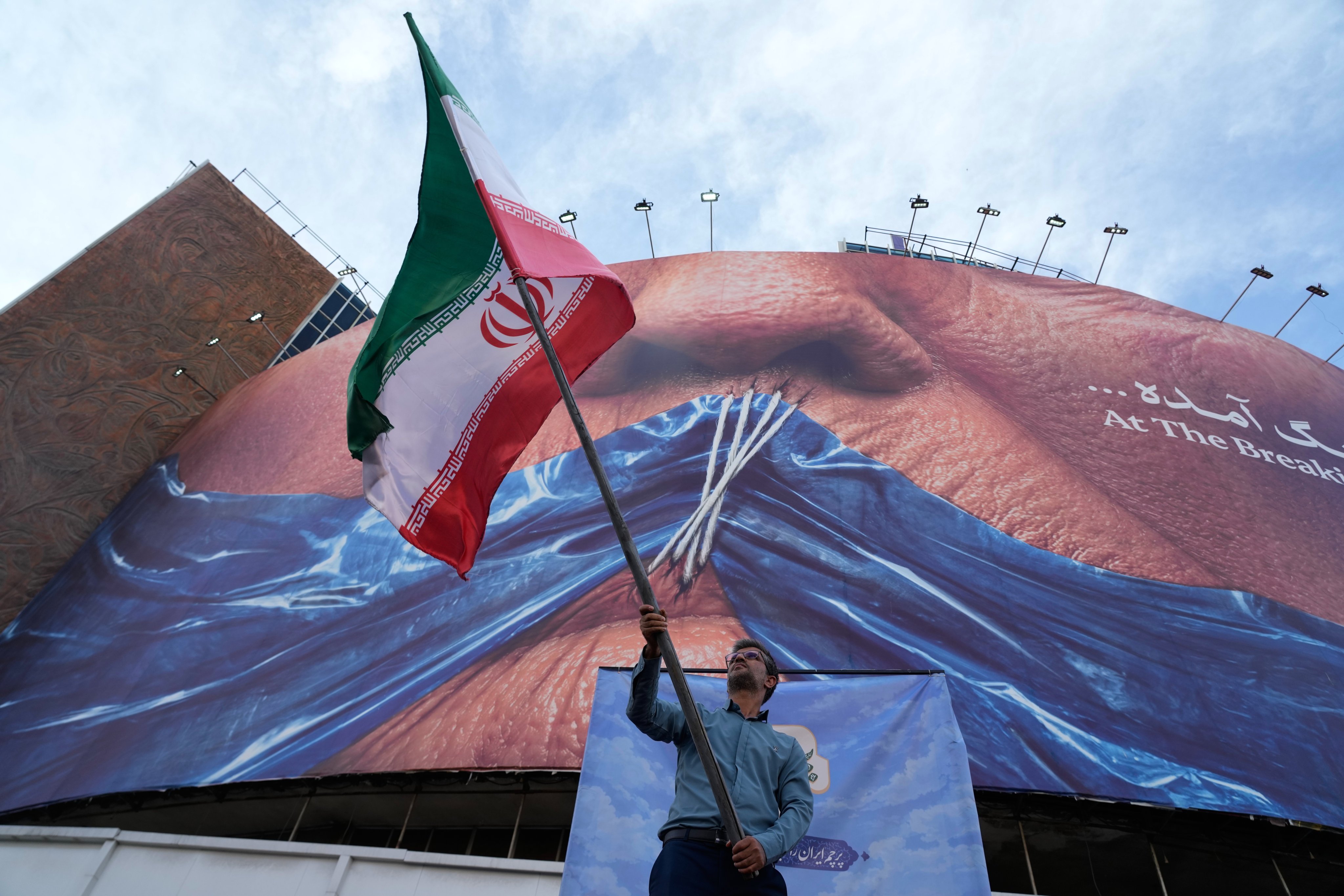 A pro-government billboard in Tehran, Iran, depicts the closed Strait of Hormuz. Photo: AP