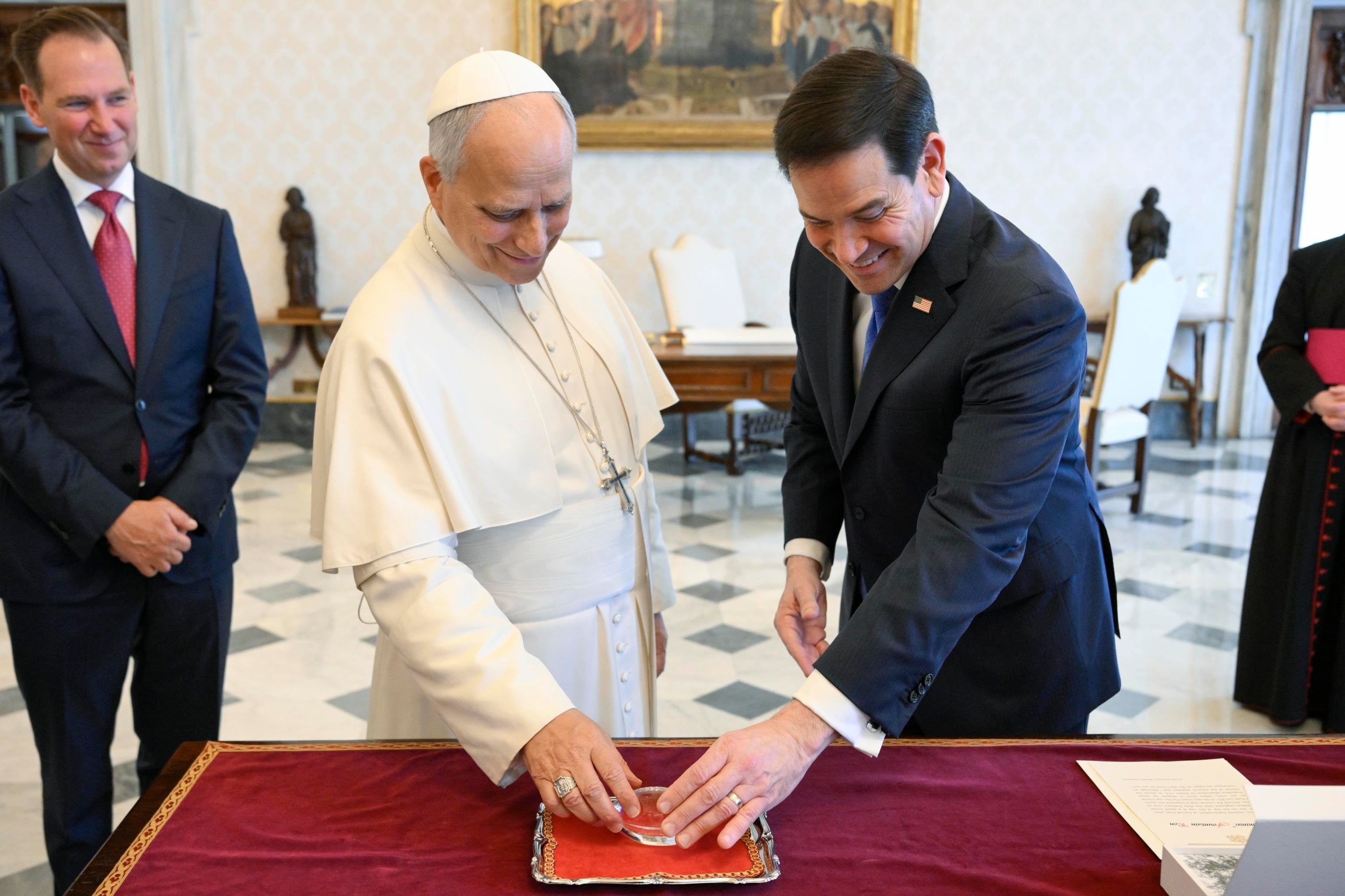 Pope Leo (centre) meets US Secretary of State Marco Rubio at the Vatican on Thursday. Photo: EPA/Vatican Media