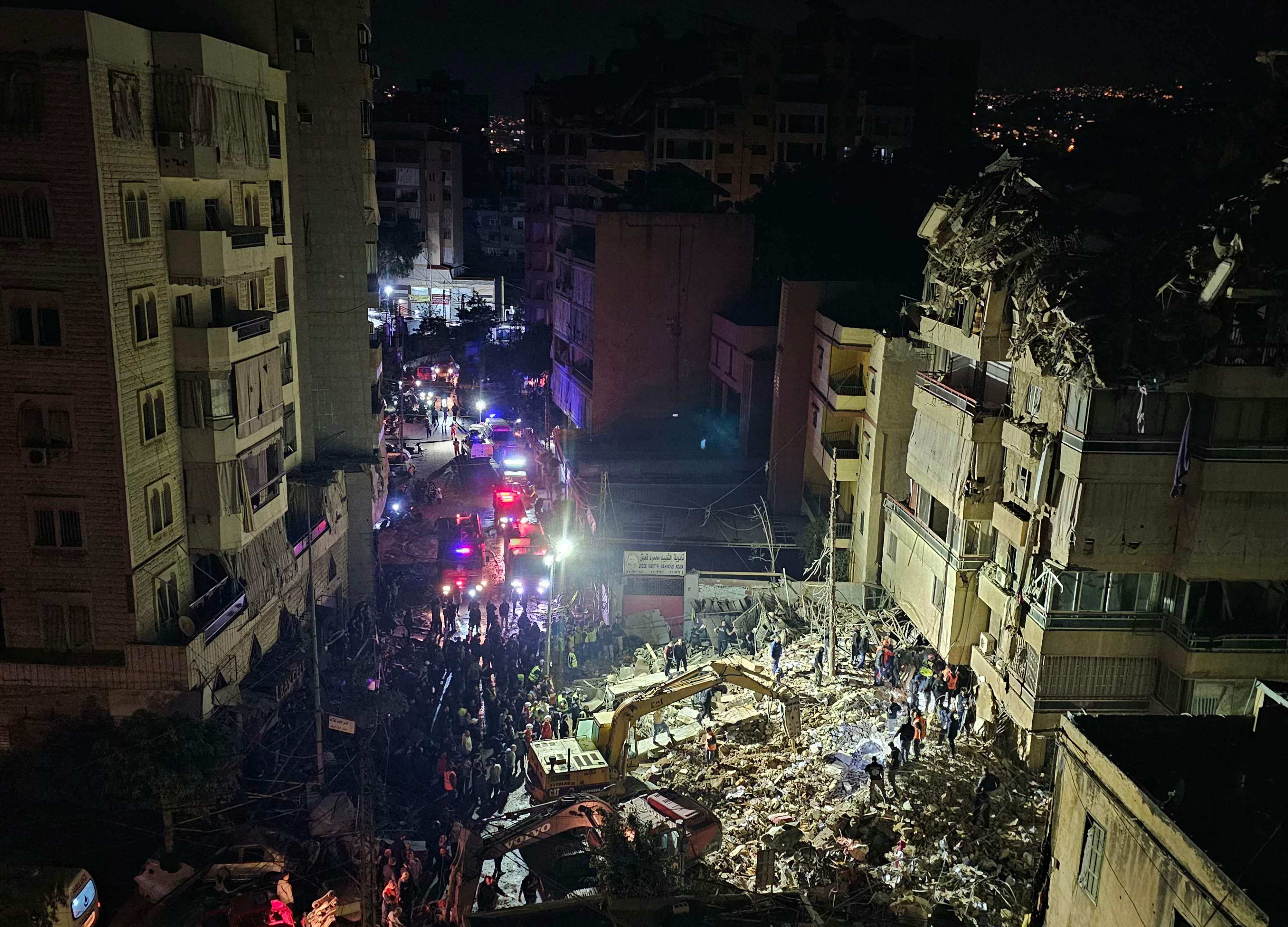 First responders in the Beirut southern suburb of Haret Hreik on Wednesday after an Israeli strike. Photo: AFP