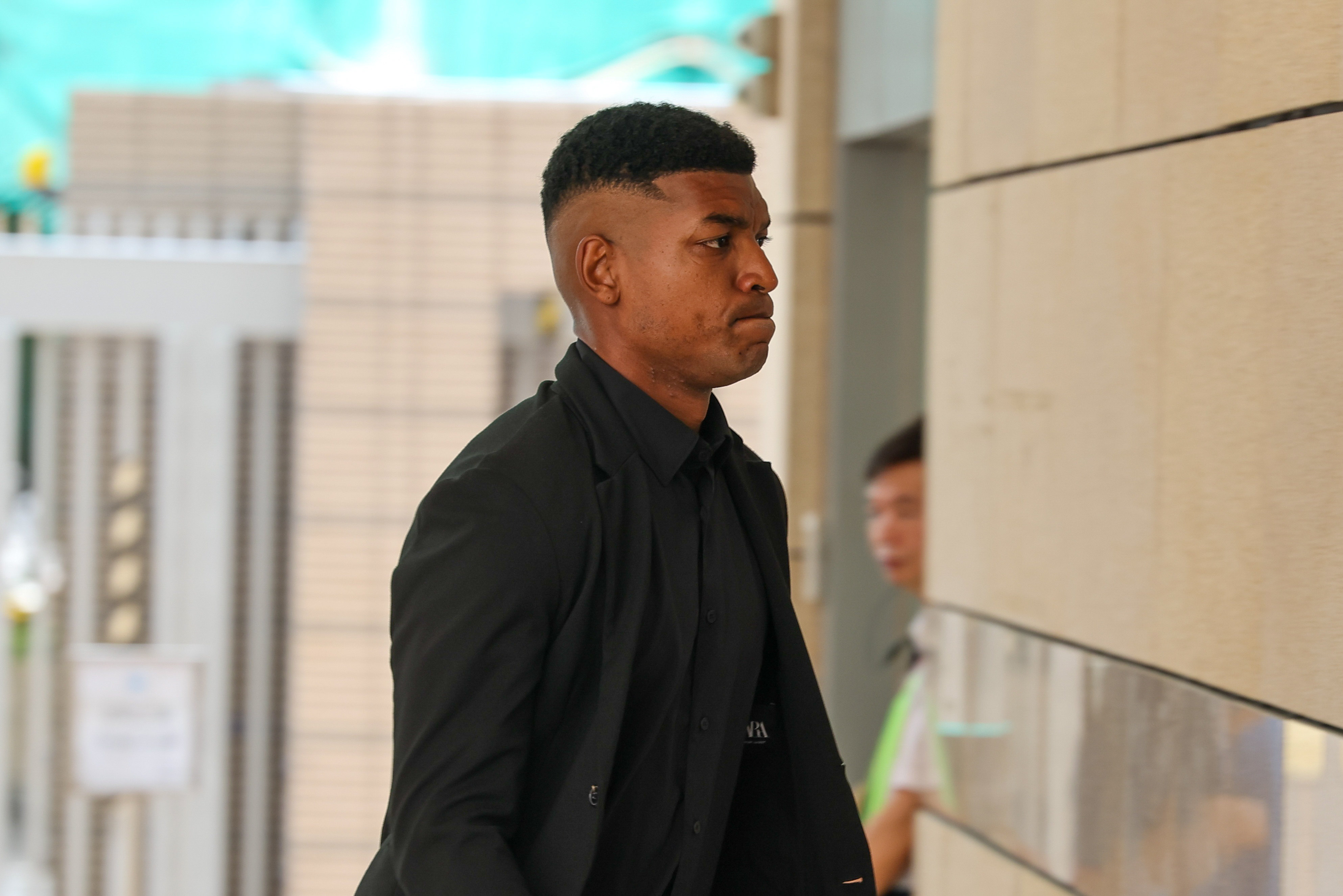 Footballer Luciano Silva da Silva arrives at the West Kowloon court for a match-fixing case. Photo: Edmond So