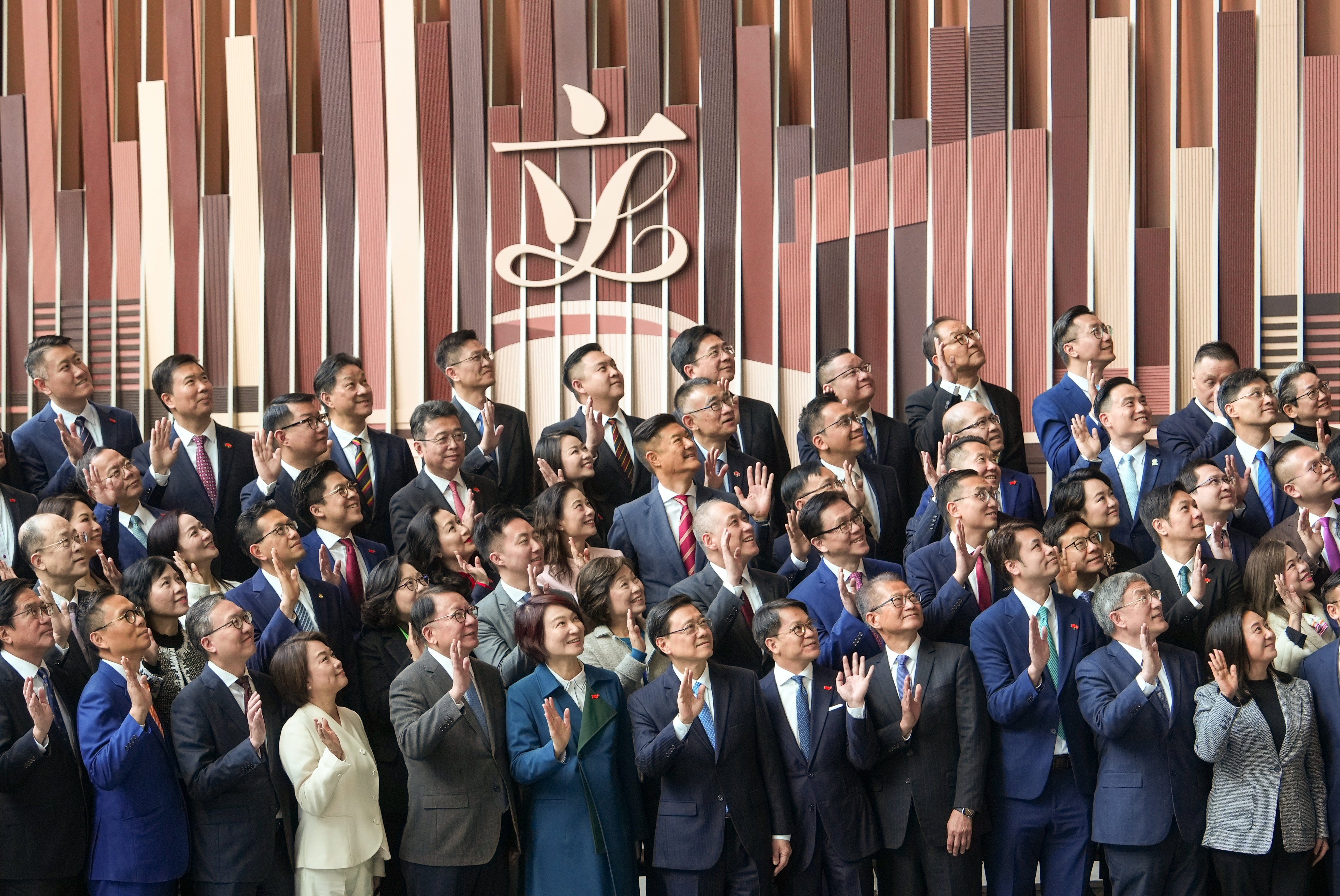 Hong Kong Chief Executive John Lee Ka-chiu (front and centre) poses for pictures with newly elected legislators at the Legislative Council building in Admiralty on January 1. Photo: Sam Tsang