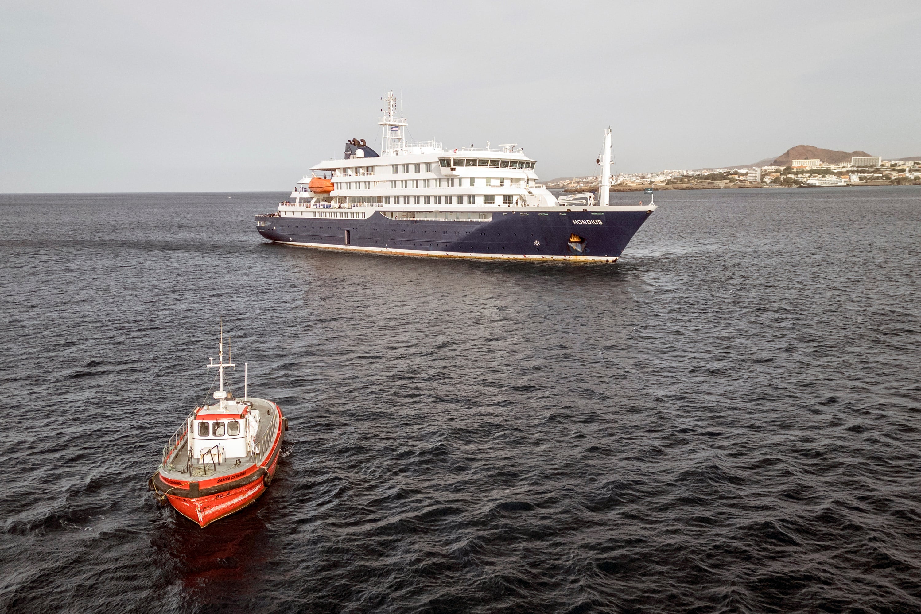 A boat heading towards the port on Wednesday from the hantavirus-hit cruise ship MV Hondius, which is stationary off the port of Praia, Cape Verde. Photo: TNS