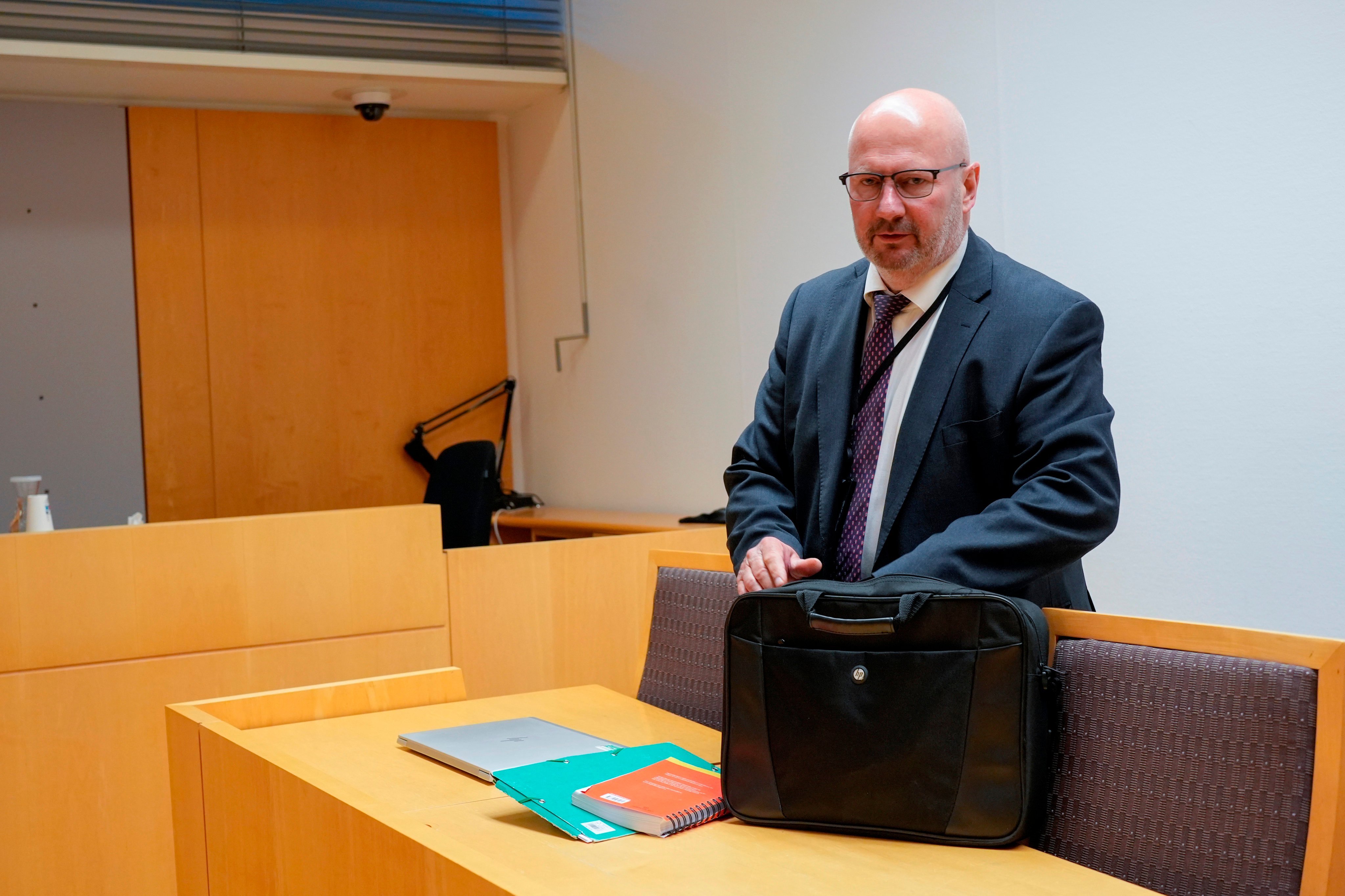 Police prosecutor Thomas Blom arrives in court before the detention hearing for a woman suspected of spying for China, in Oslo, Norway on Tuesday. Photo: NTB Scanpix via AP