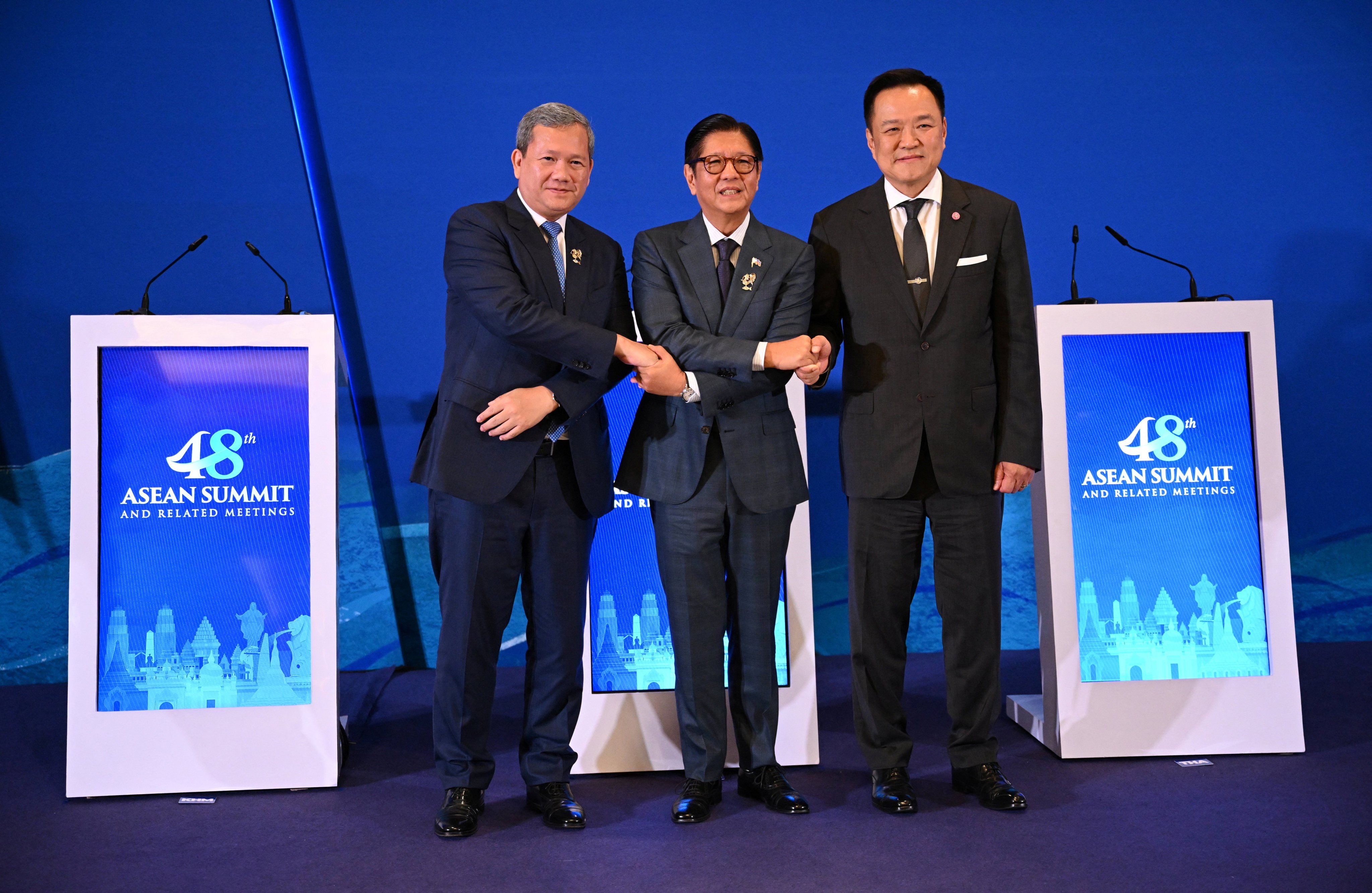 Thai Prime Minister Anutin Charnvirakul (right), Cambodian leader Hun Manet (left) and Philippine President Ferdinand Marcos Jnr hold hands as they meet ahead of the Asean summit in Cebu, Philippines, on Thursday. Photo: Reuters