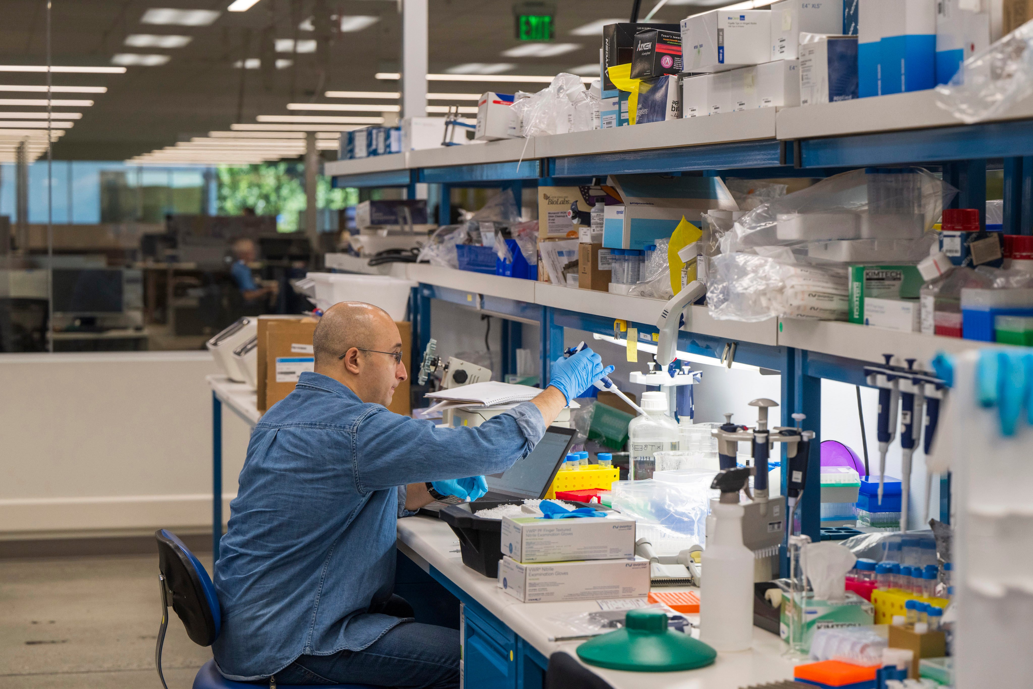A lab technician prepares DNA samples for analysis at US company Complete Genomics. Photo: AP