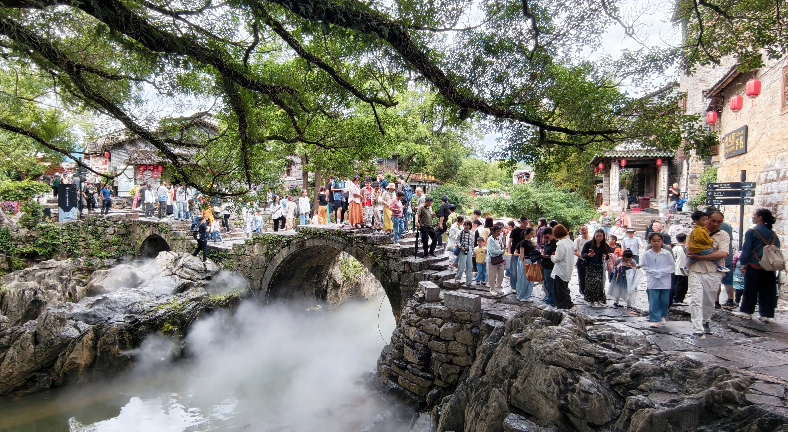 Tourists visit the Huangyao ancient town in Zhaoping county,  Guangxi Zhuang autonomous region, on May 3. Photo: Xinhua