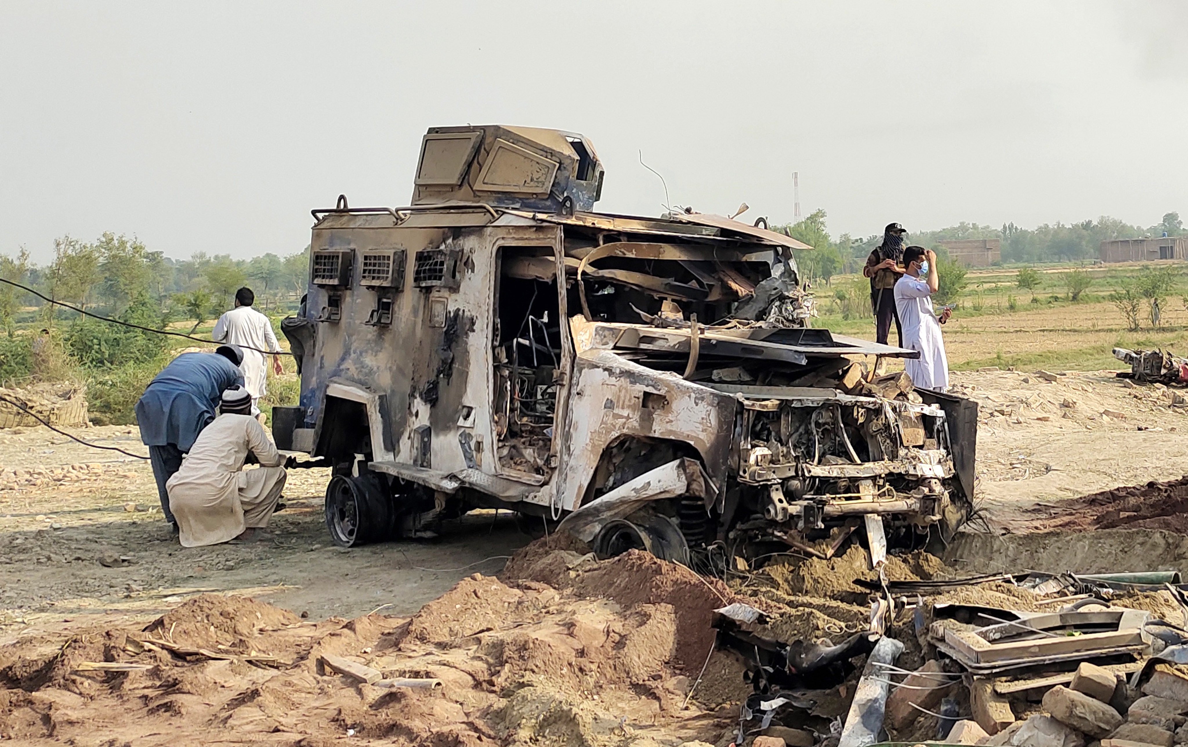 A destroyed police armoured at the site of a suicide attack in Bannu district, Khyber Pakhtunkhwa province, Pakistan, on Sunday. Photo: Xinhua