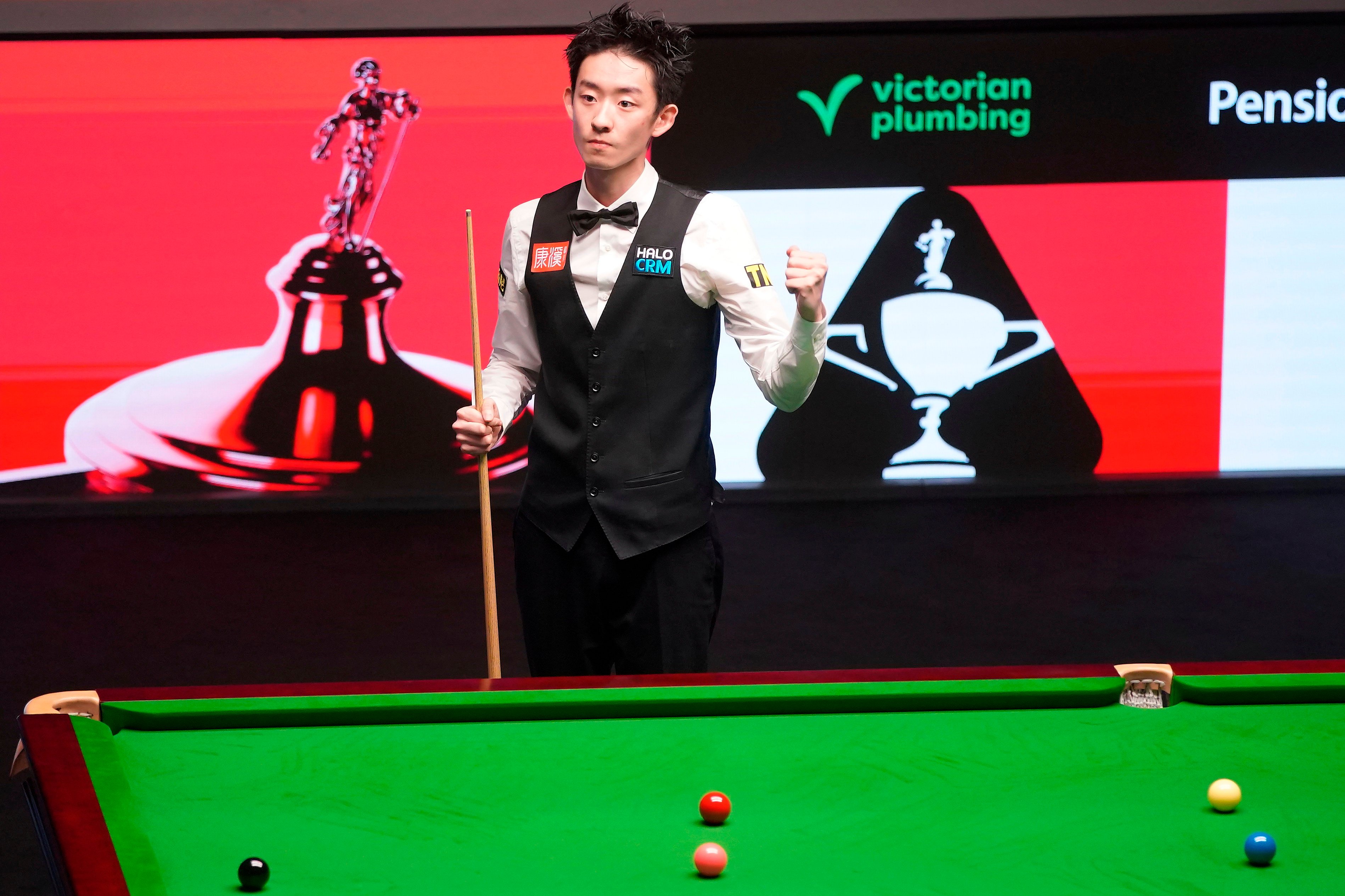 China’s Wu Yize celebrates after winning the World Snooker Championship defeating England’s Shaun Murphy. Photo: AP