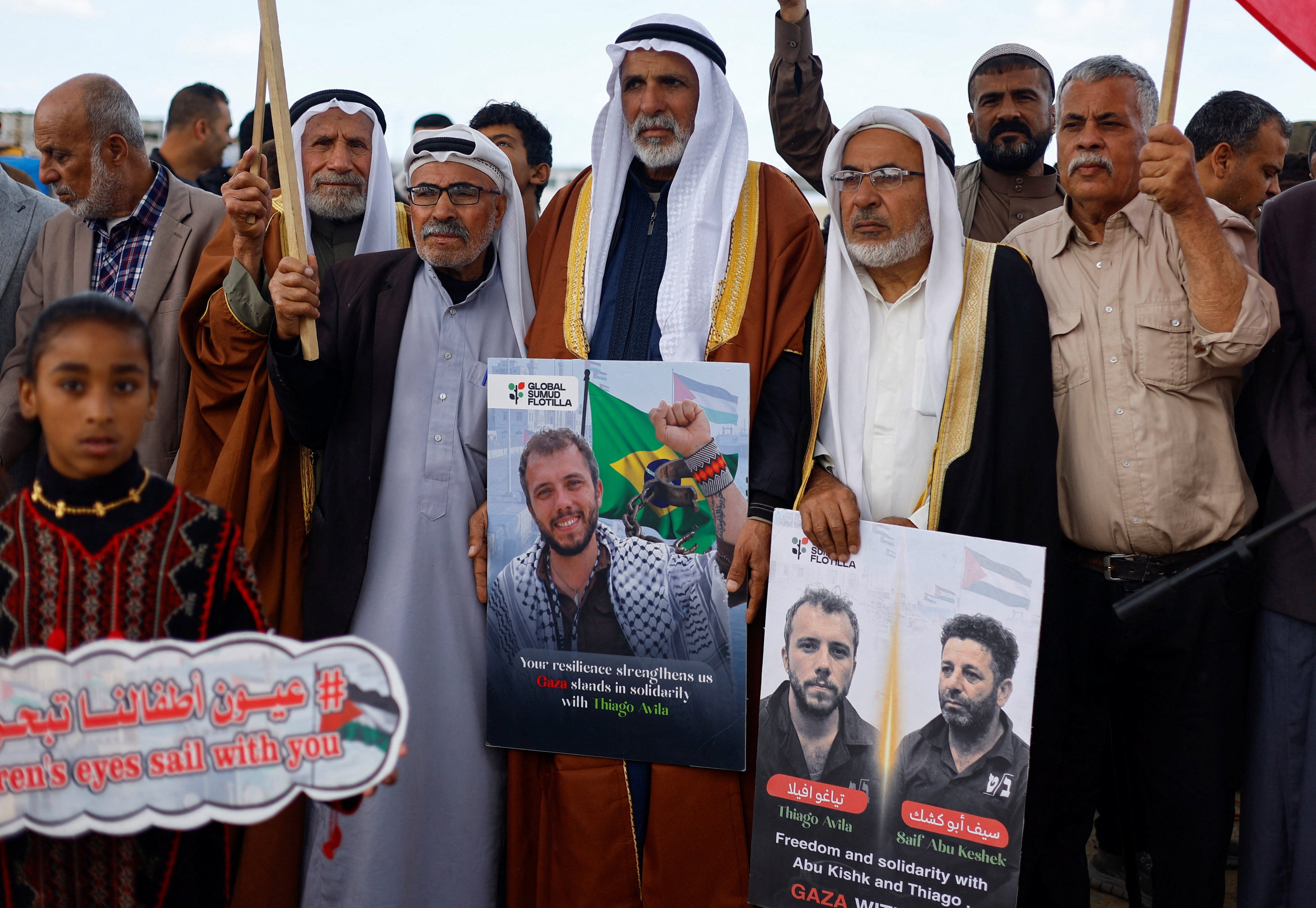 Palestinians take part in a protest in solidarity with activists Saif Abu Keshek, a Spanish national, and Brazilian Thiago Avila, who were arrested aboard the Gaza-bound Global Sumud Flotilla, which was intercepted by Israeli forces in international waters, in Gaza City on Tuesday. Photo: Reuters