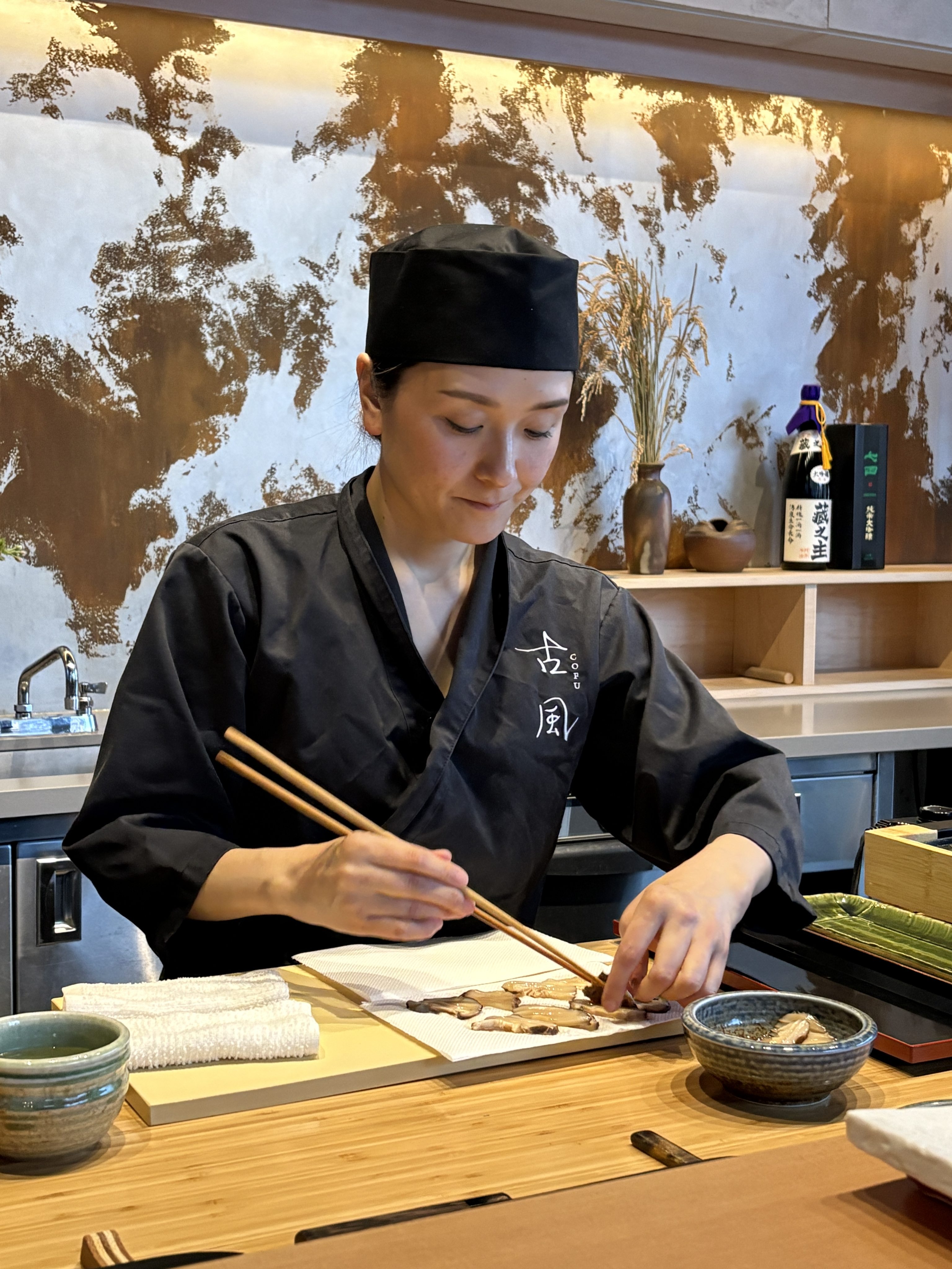 Chef Akiko Gulkison prepares mushrooms at her vegan restaurant Cofu Chinatown, in Vancouver, Canada. Photo: Bernice Chan