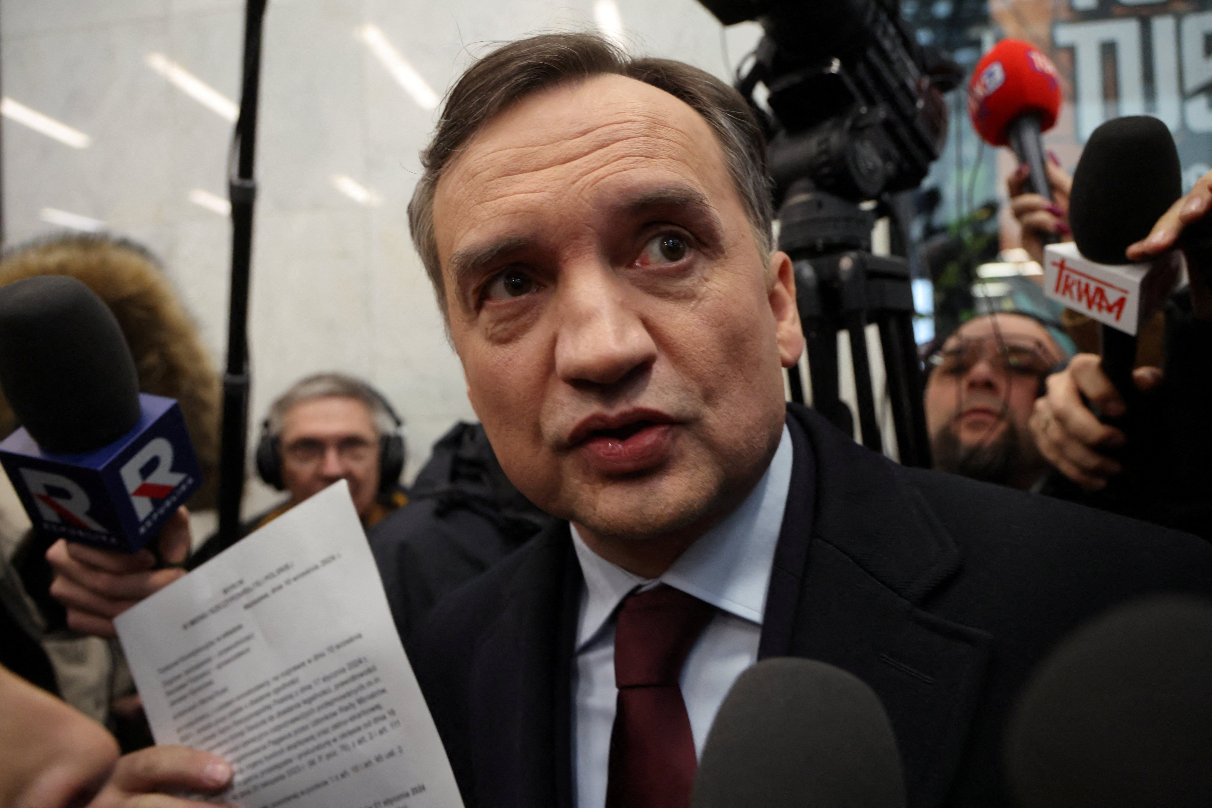 Poland’s former justice minister Zbigniew Ziobro reacts after he was detained by police at the Polish TV Republika station’s headquarters in Warsaw, Poland in January last year. Photo: via Reuters