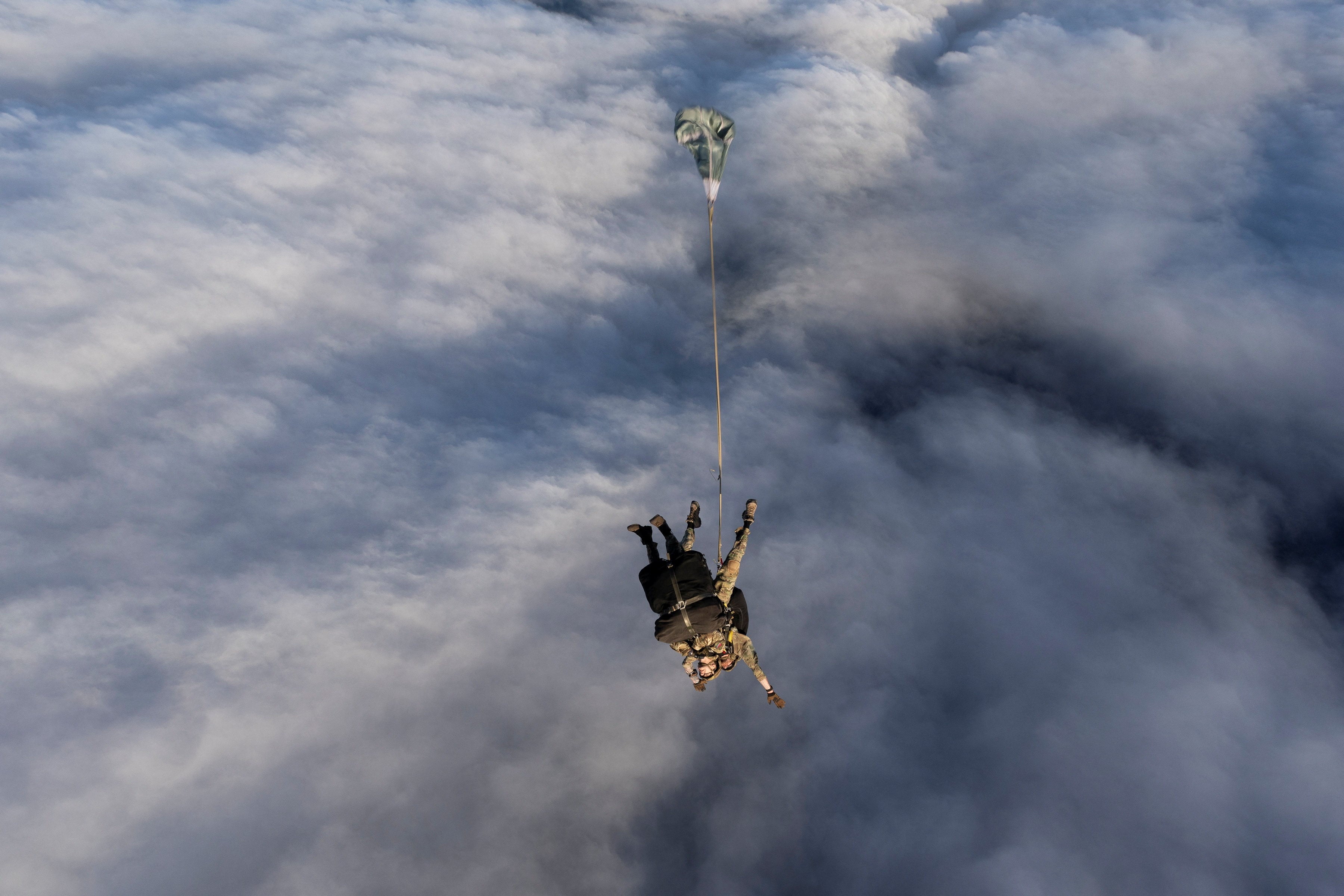 An ICU nurse and a paratrooper make the jump. Photo: UK MOD via Reuters