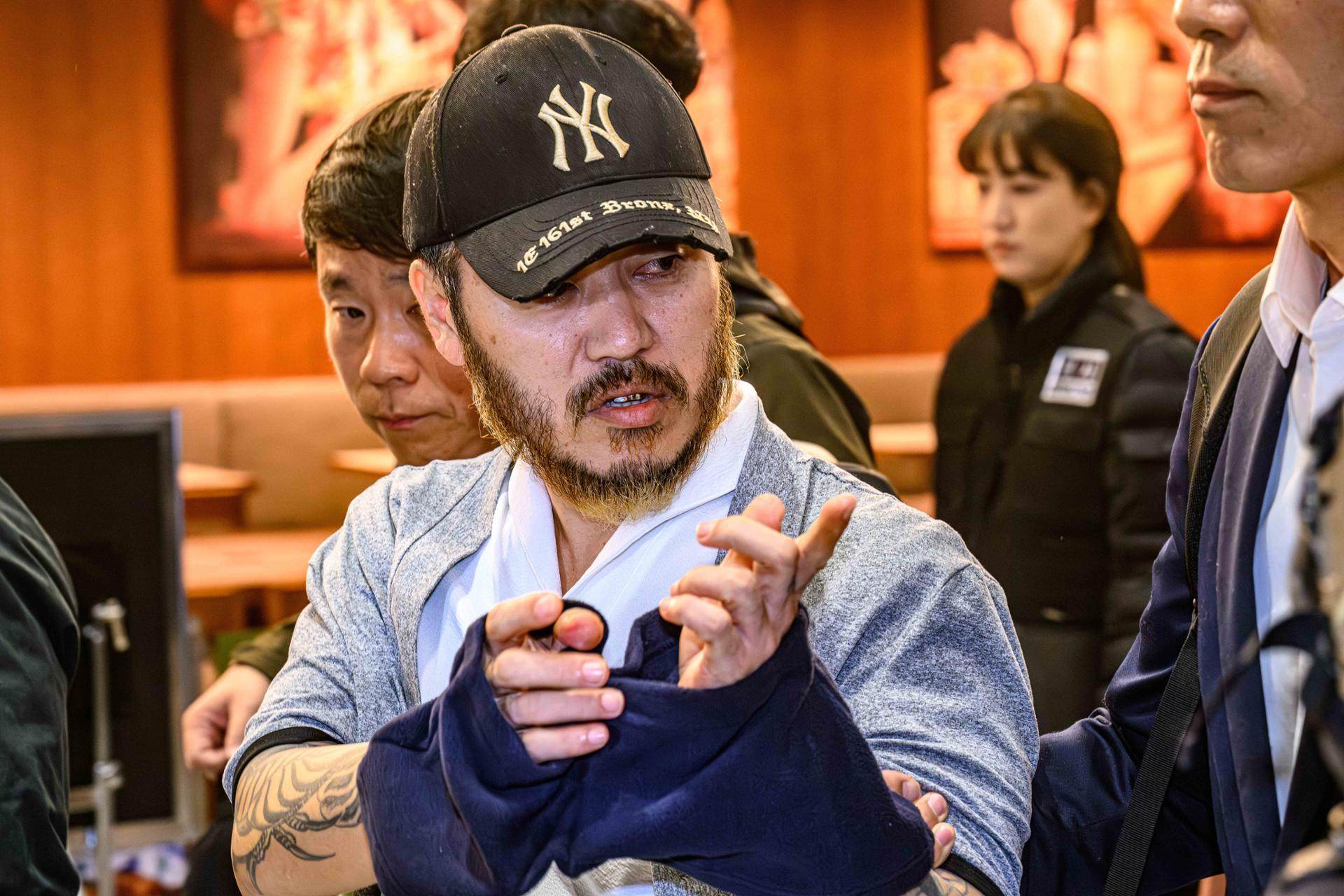 Park Wang-yeol at Incheon International Airport on March 25 after being extradited from the Philippines. Photo: Korea Times