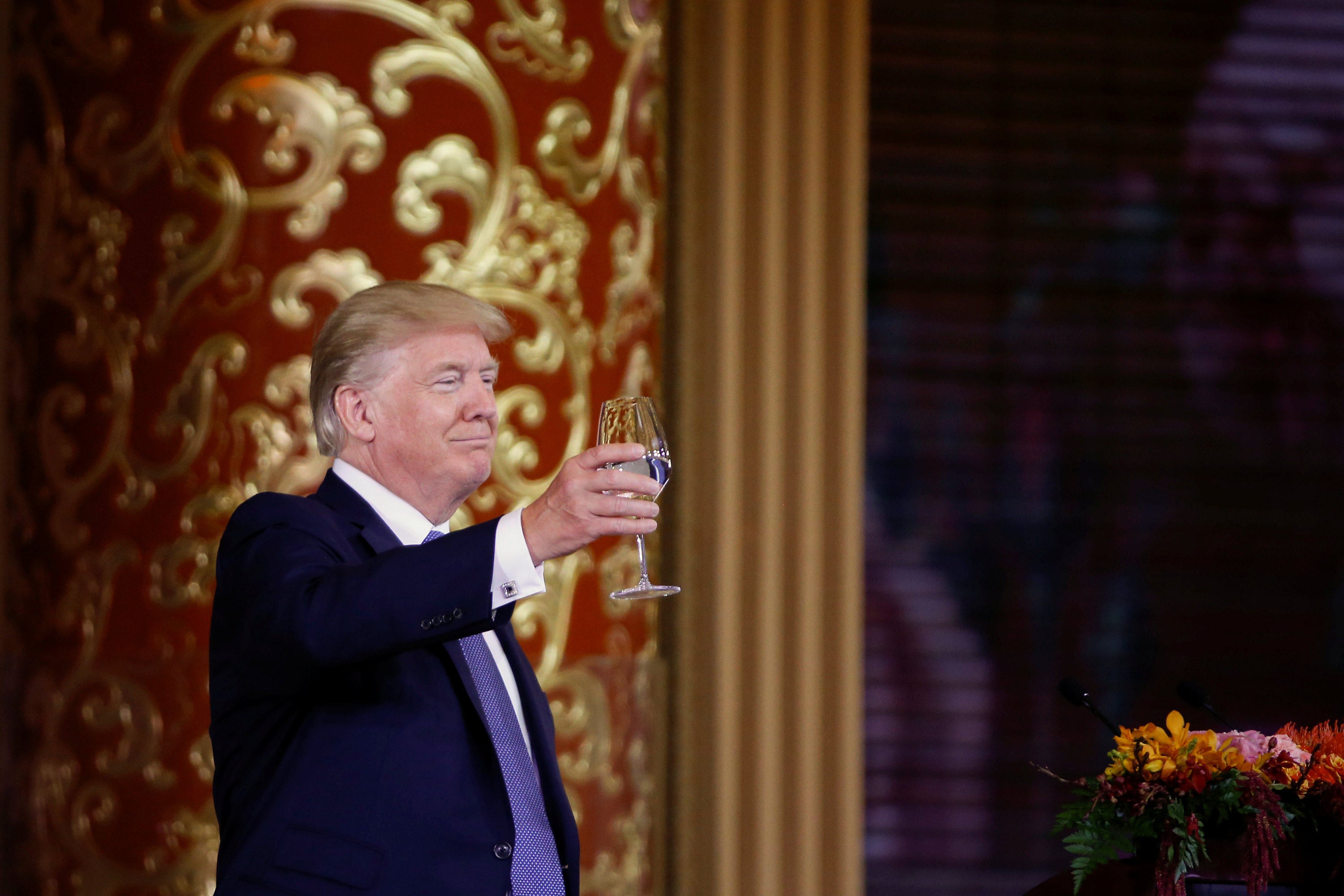 Donald Trump attends a state dinner at the Great Hall of the People, in Beijing, in 2017. Photo: Reuters