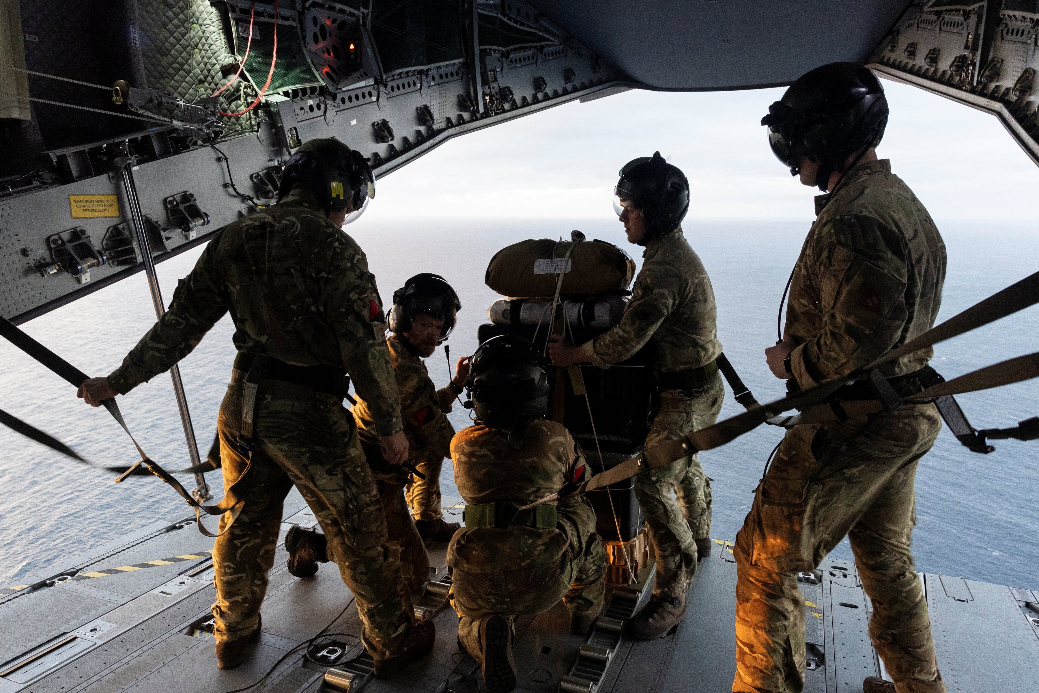 Crew prepare to drop supplies. Photo: UK MOD via Reuters