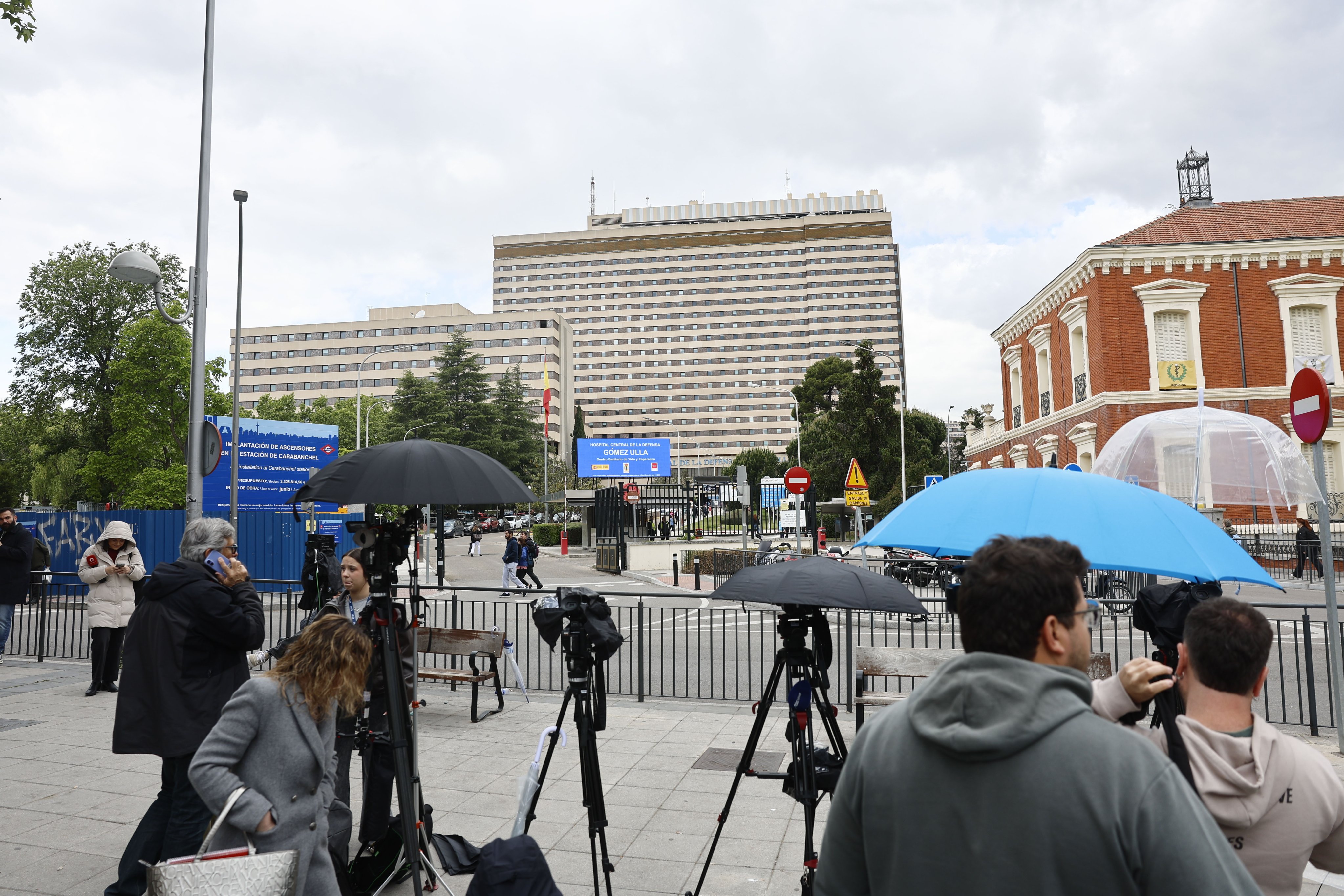 Members of the media gather in front of the entrance to the Gomez Ulloa Hospital in Madrid on Tuesday, where Spanish passengers from the MV Hondius cruise have been taken for quarantine. Photo: EPA
