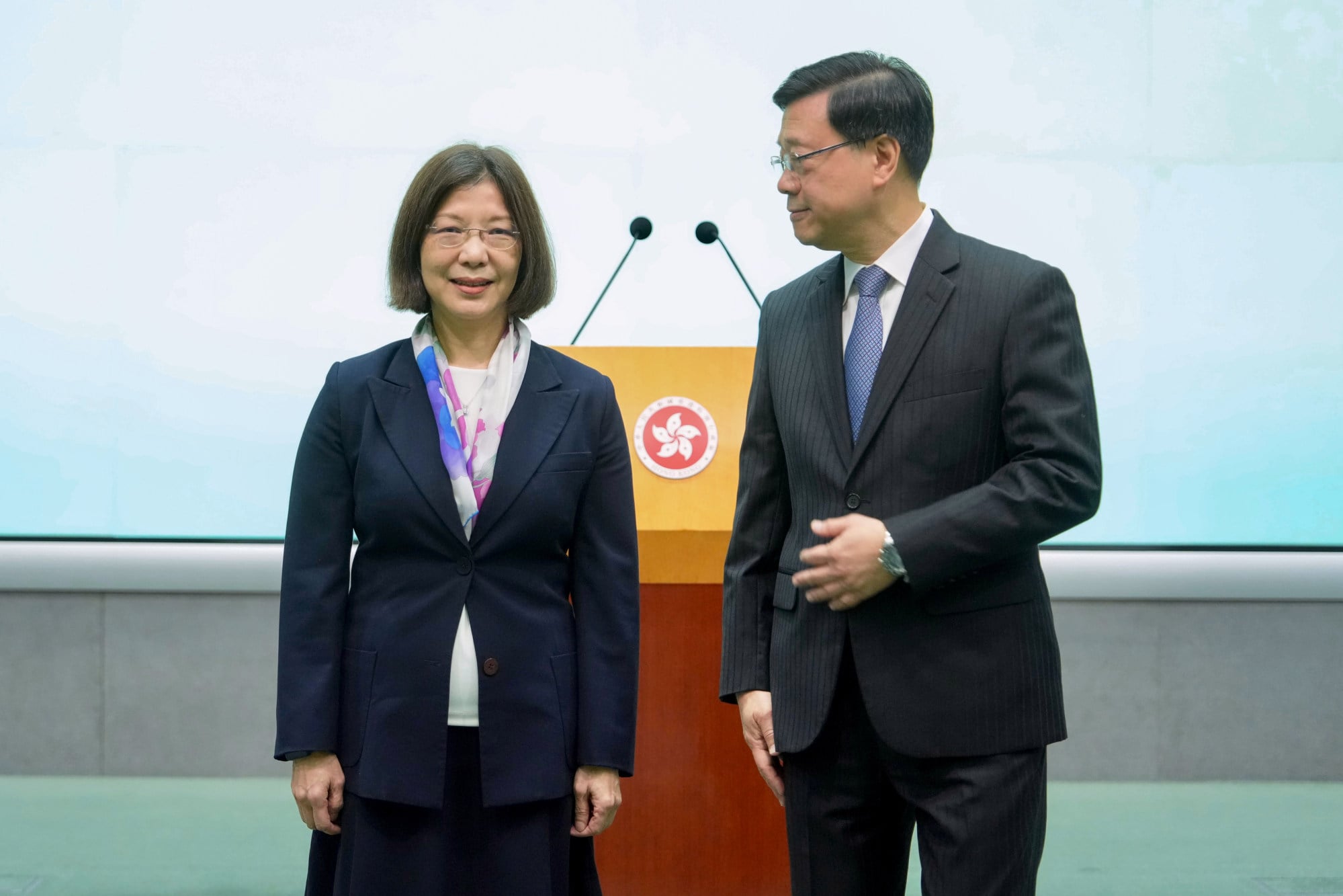 Chief Executive John Lee and newly appointed Secretary for Constitutional and Mainland Affairs Janice Tse meet the media on March 30. Photo: Sam Tsang