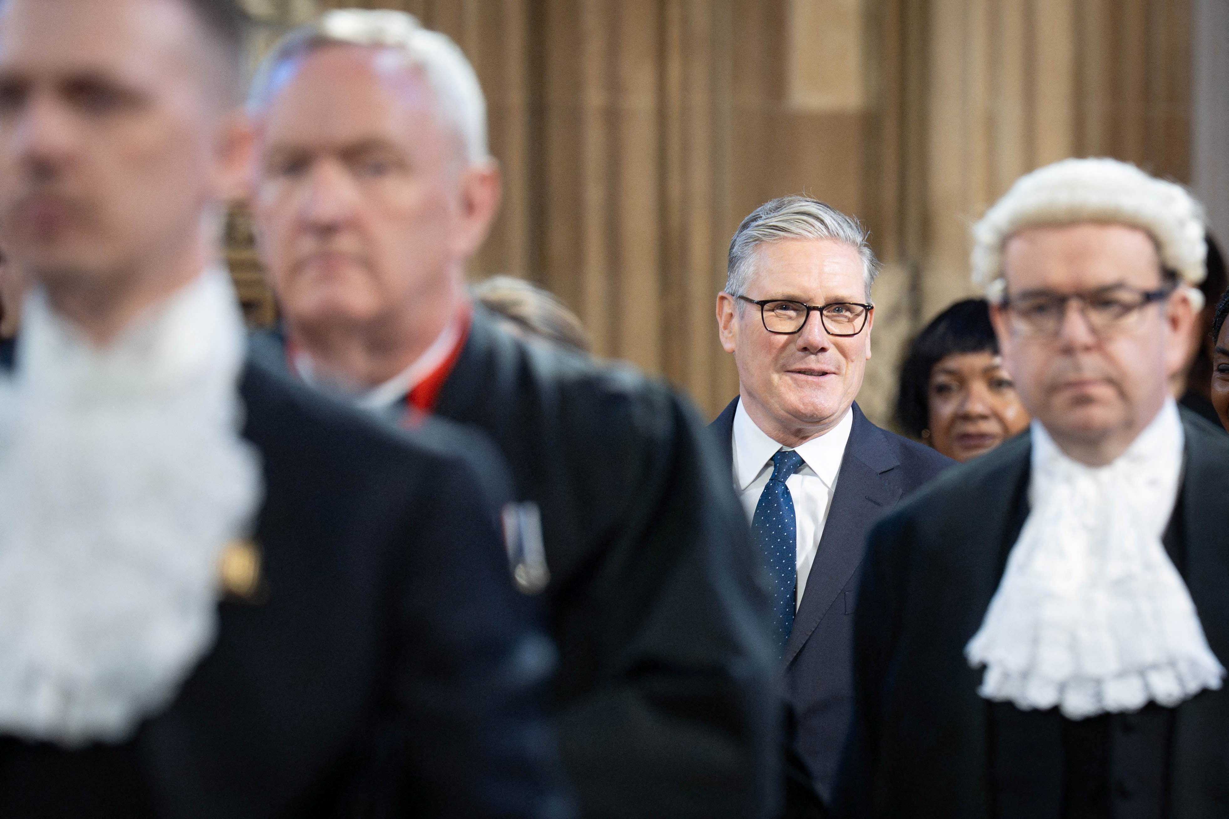 Britain’s Prime Minister Keir Starmer walks through the Central Lobby of the Houses of Parliament in London to the House of Lords to hear the King’s Speech on Wednesday. Photo: Reuters