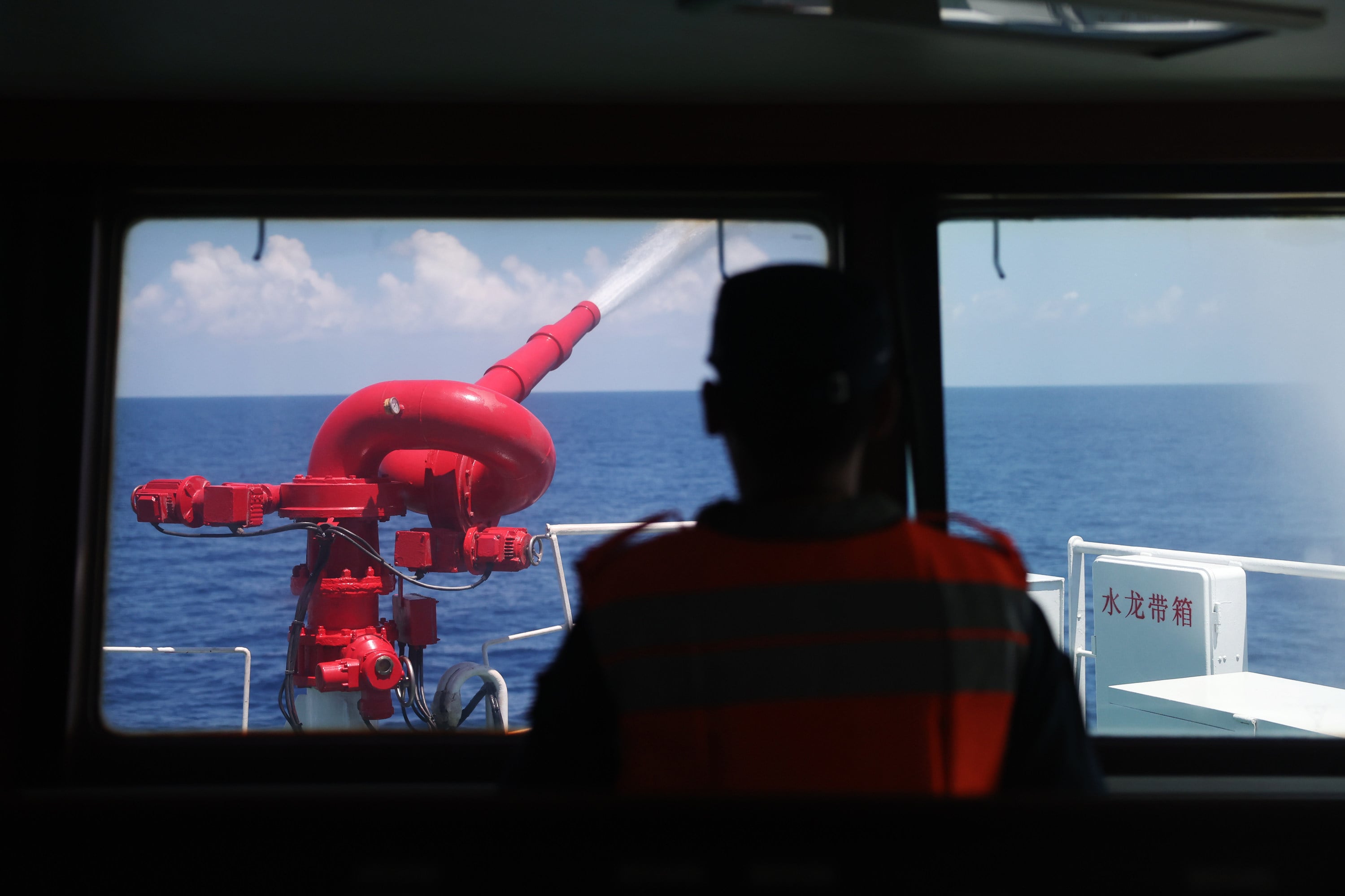 A Chinese coastguard vessel tests its water cannon in the South China Sea on May 5. Photo: Xinhua