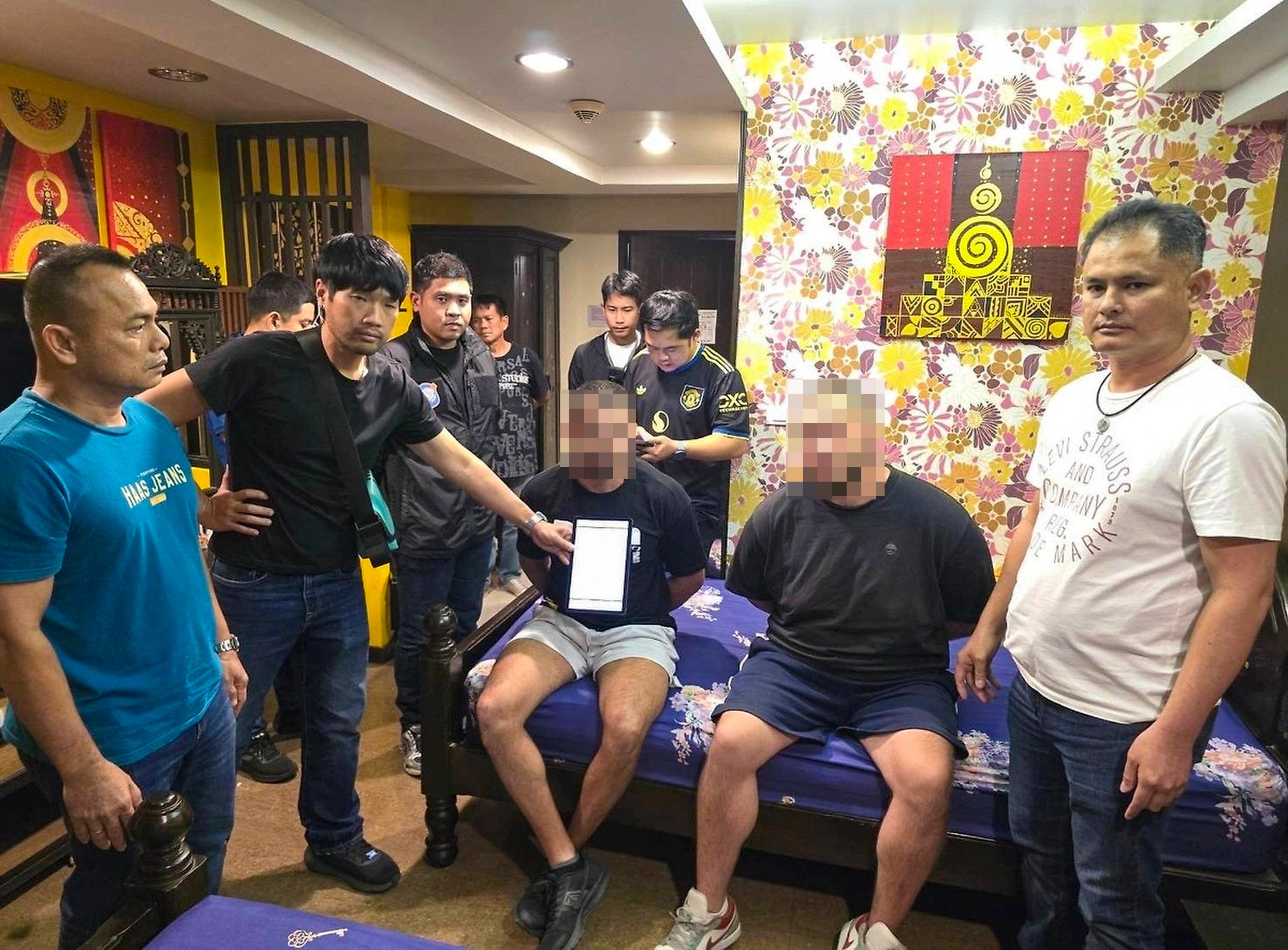 Thai police arrest two Russians suspected of murdering a fellow national near the resort town of Pattaya in February. Photo: Handout