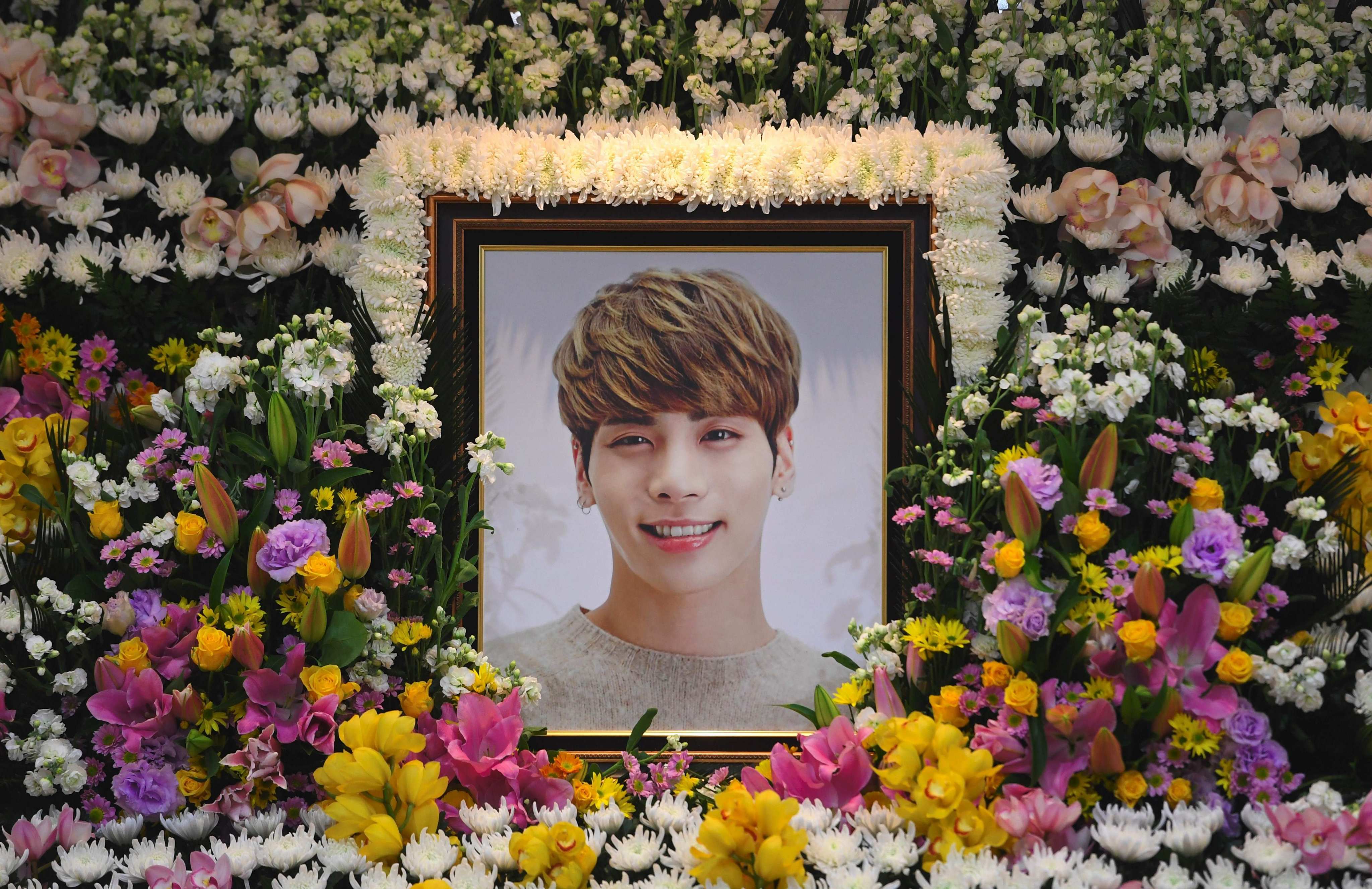 A portrait of Kim Jong-Hyun, the 27-year-old lead singer of the massively popular K-pop boy band SHINee, seen on a mourning altar at a hospital in Seoul on December 19, 2017. Photo: AFP