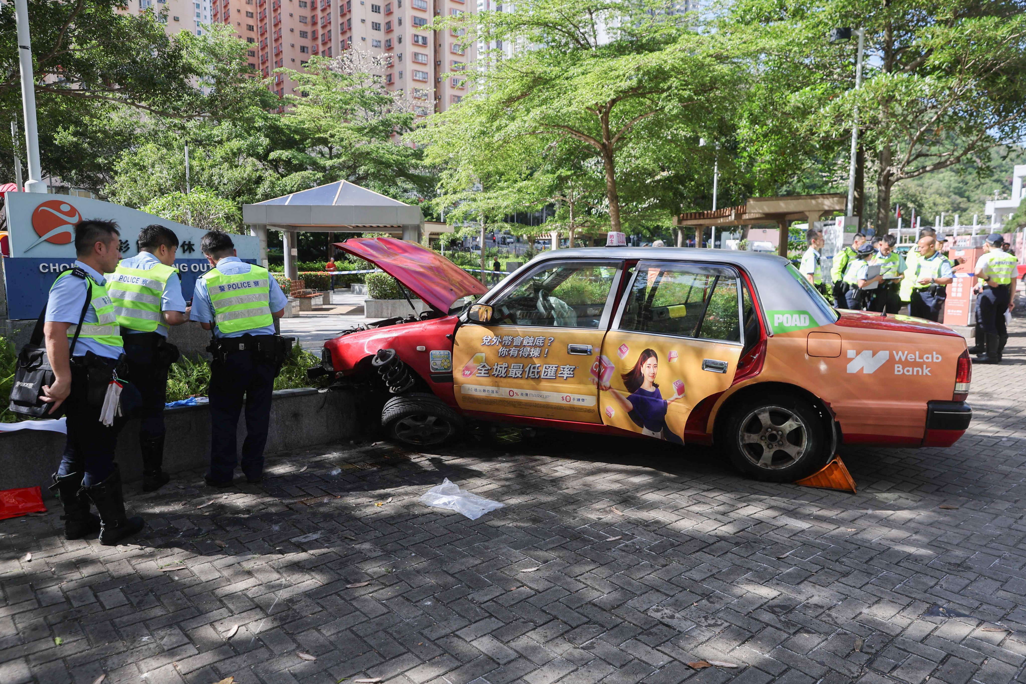 The taxi mounted the pavement in Ngau Tau Kok, killing one pedestrian and seriously injuring another. Photo: Edmond So