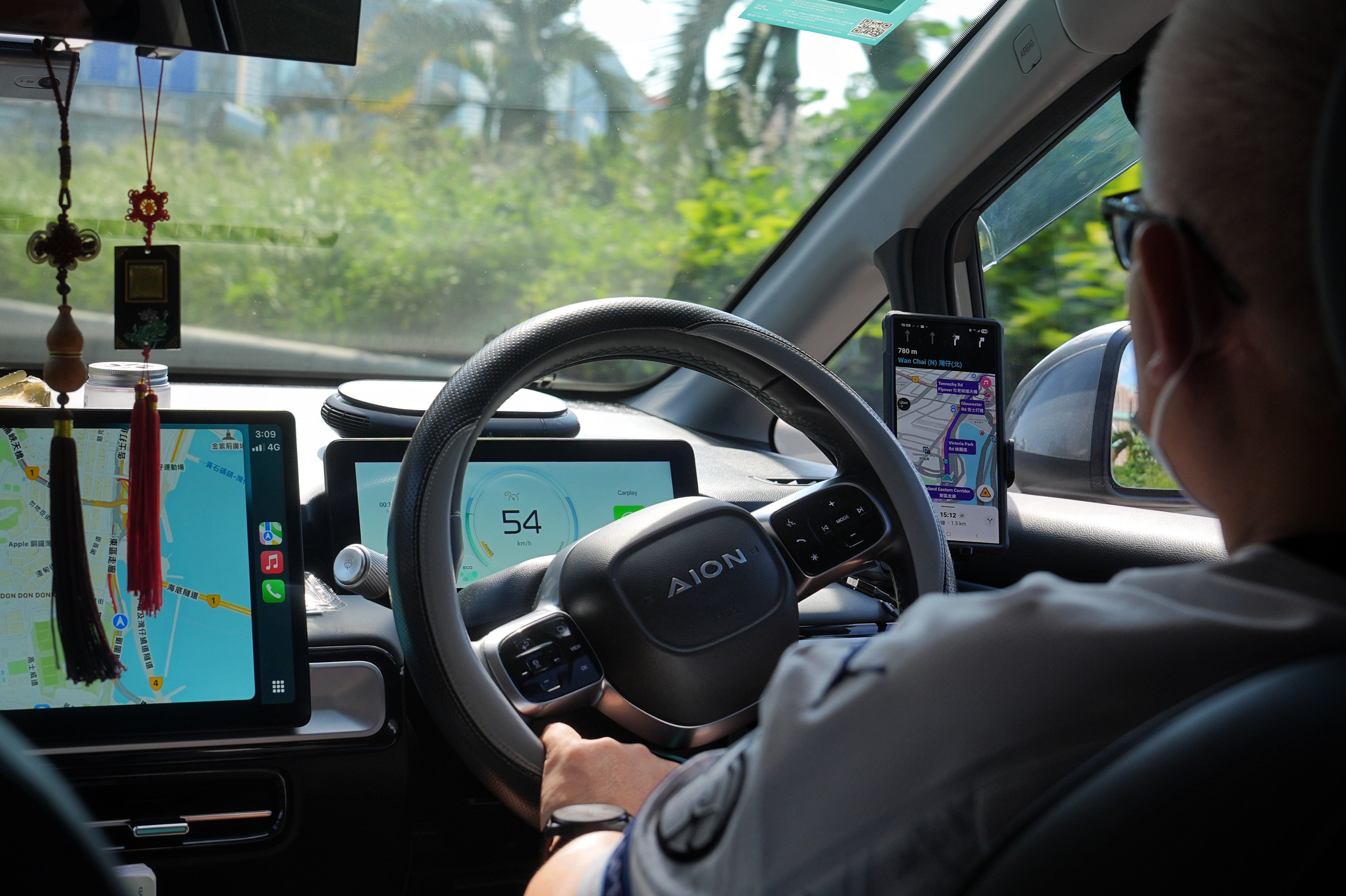 Hong Kong authorities have begun laying out details on how they plan to regulate ride-hailing platforms such as Uber, Tada and Didi Chuxing. Photo: Elson Li