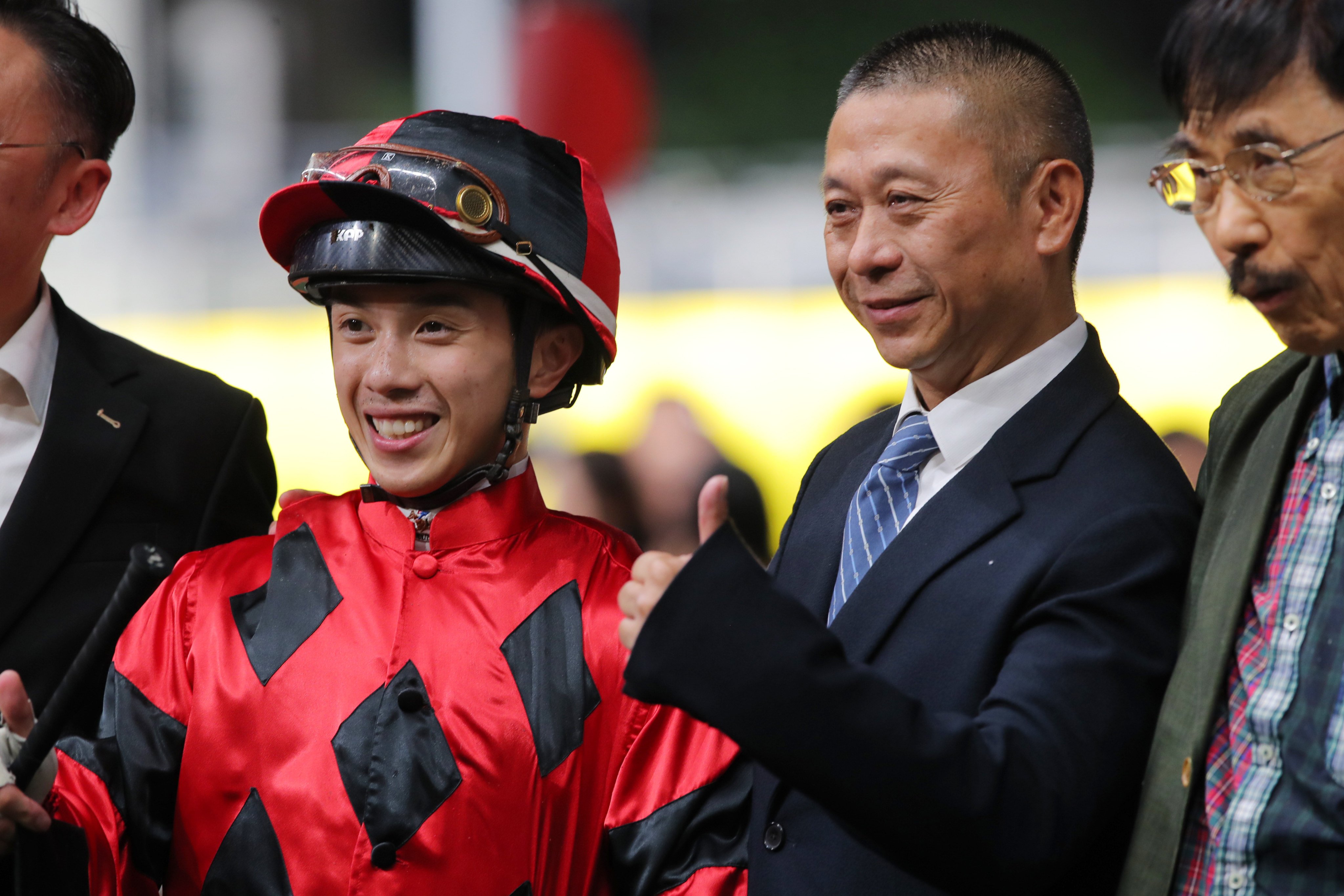Jockey Angus Chung and trainer Danny Shum celebrate General Redwood’s Happy Valley win. Photos: Kenneth Chan