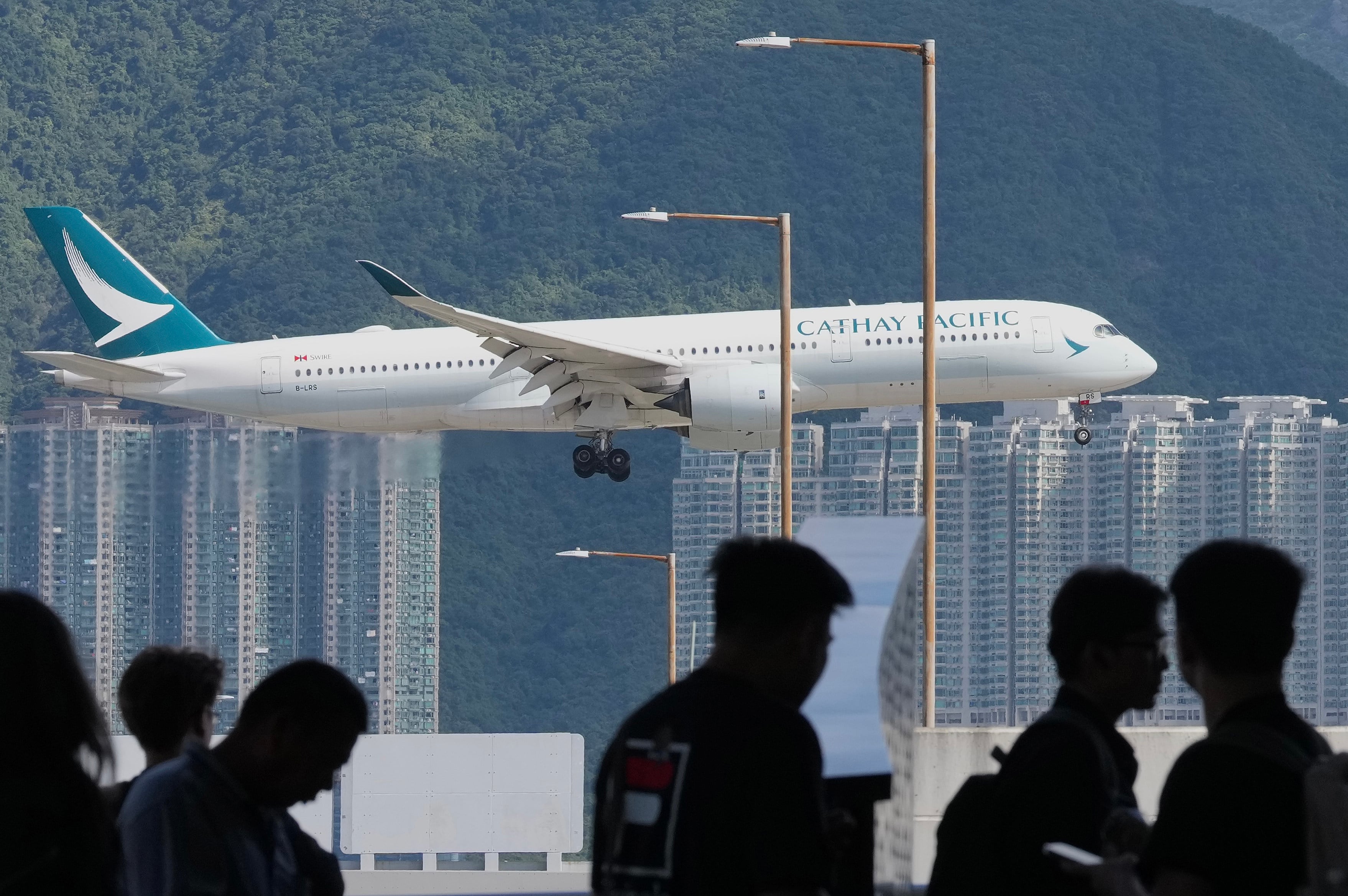 A Cathay Pacific aircraft approaches Hong Kong International Airport in Chek Lap Kok. Photo: Karma Lo