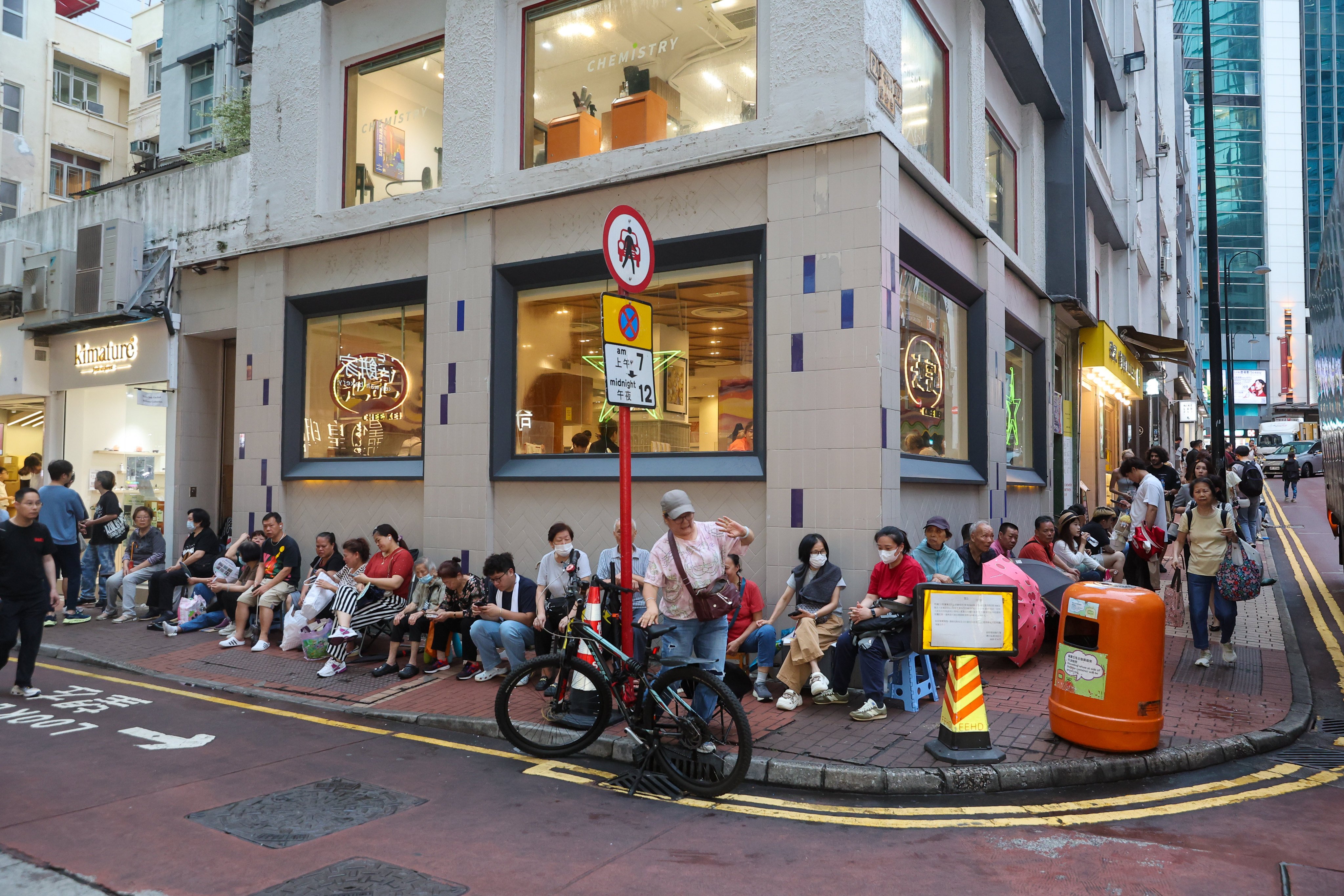 People queue up outside the Swatch store in Causeway Bay. Photo: Edmond So