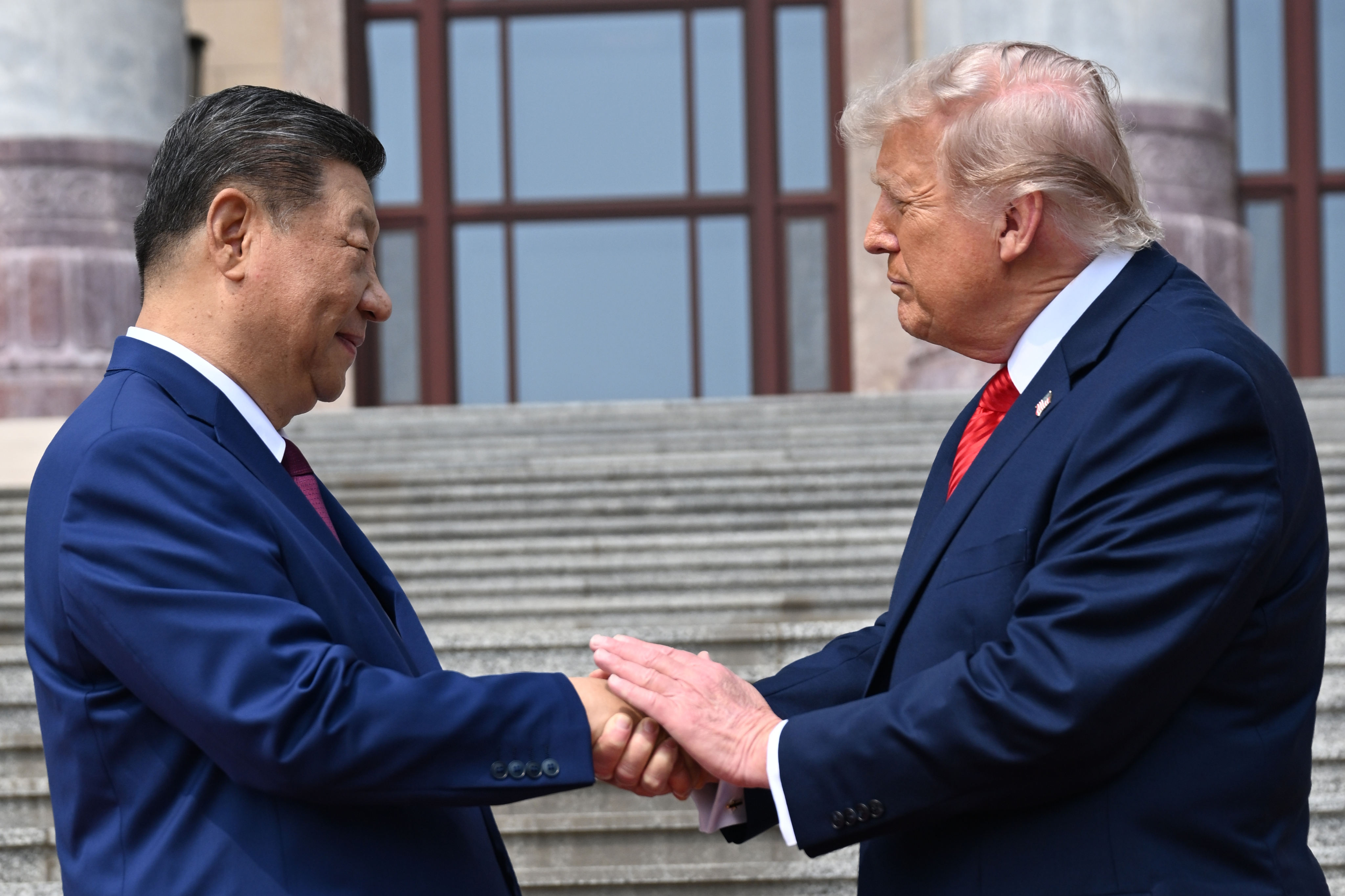 Chinese President Xi Jinping and US President Donald Trump meet outside the Great Hall of the People in Beijing on Thursday. Photo: AP