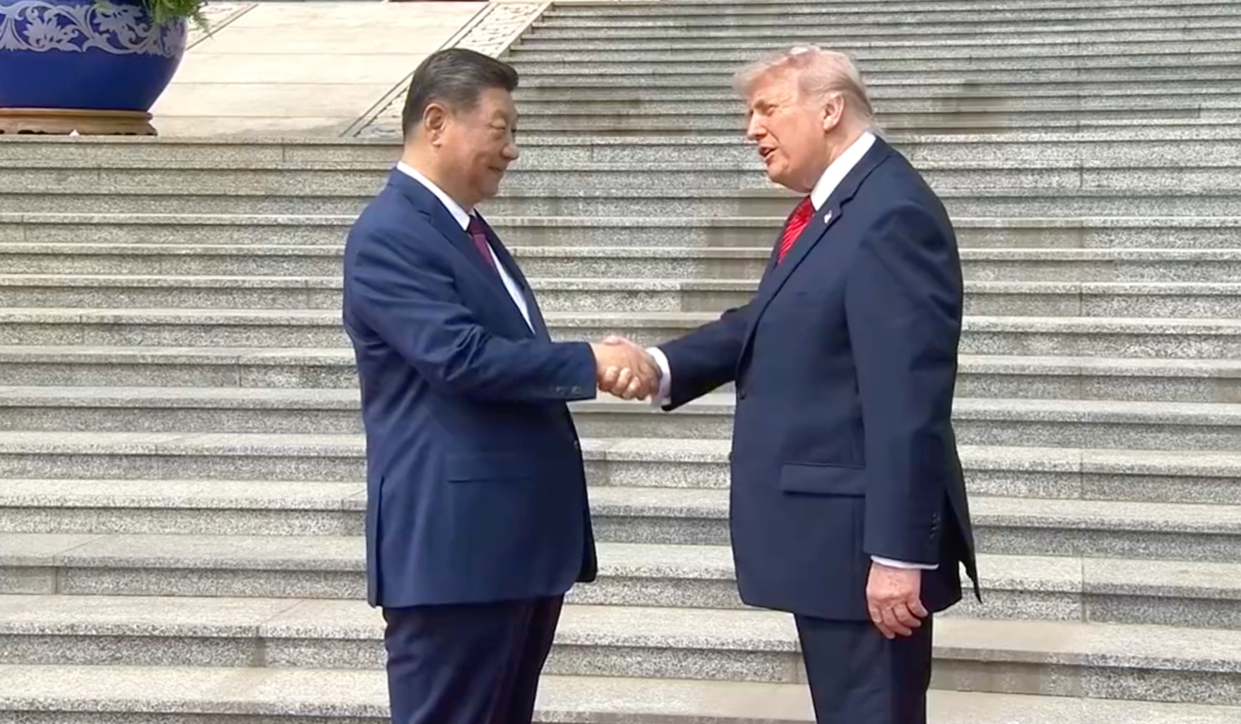 Chinese President Xi Jinping and US President Donald Trump shake hands. Photo: CCTV