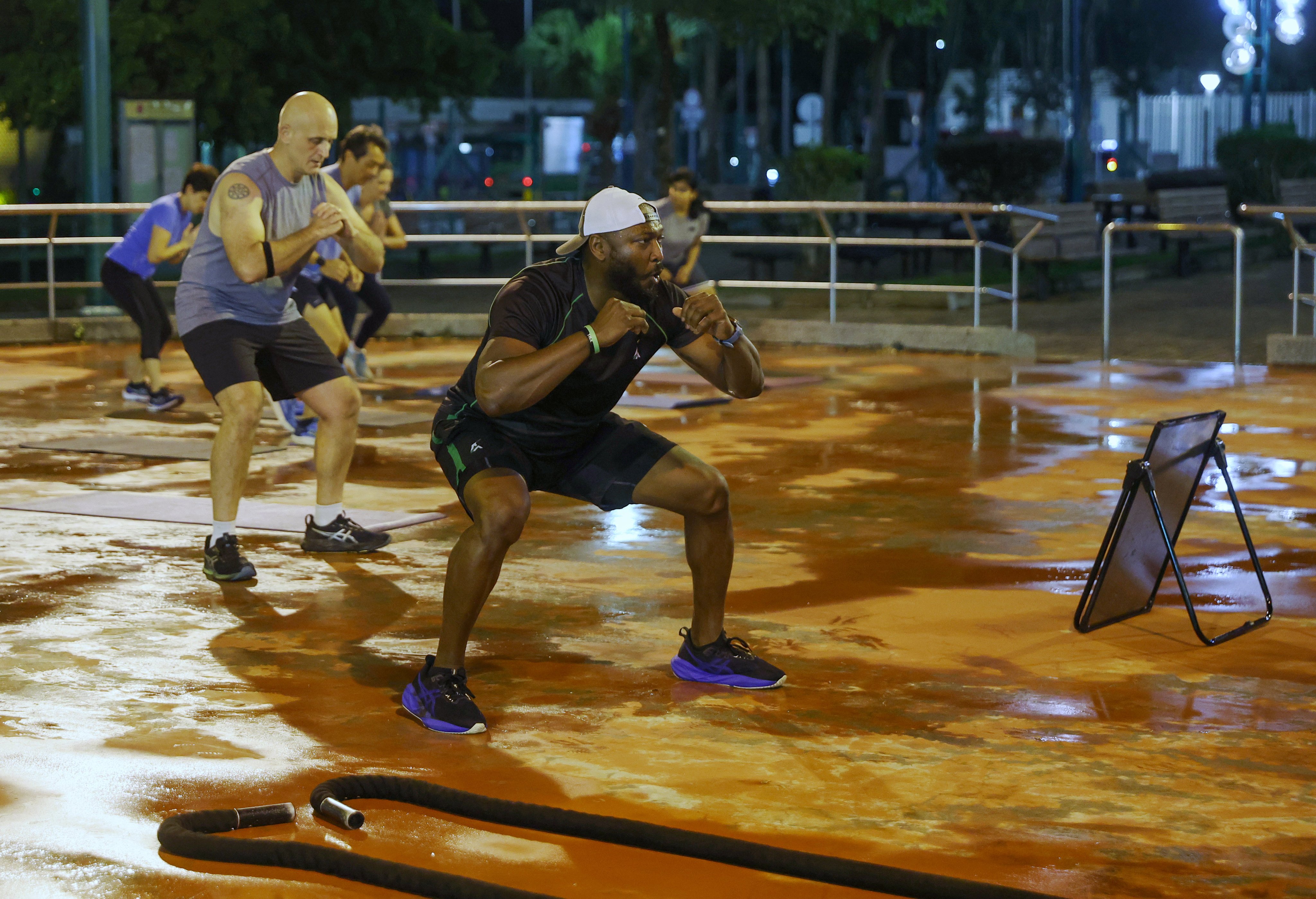 Fitness coach Ash Ayonote leads a group session at the Wai Man Road Playground in Sai Kung, in Hong Kong’s New Territories. Photo: Edmond So
