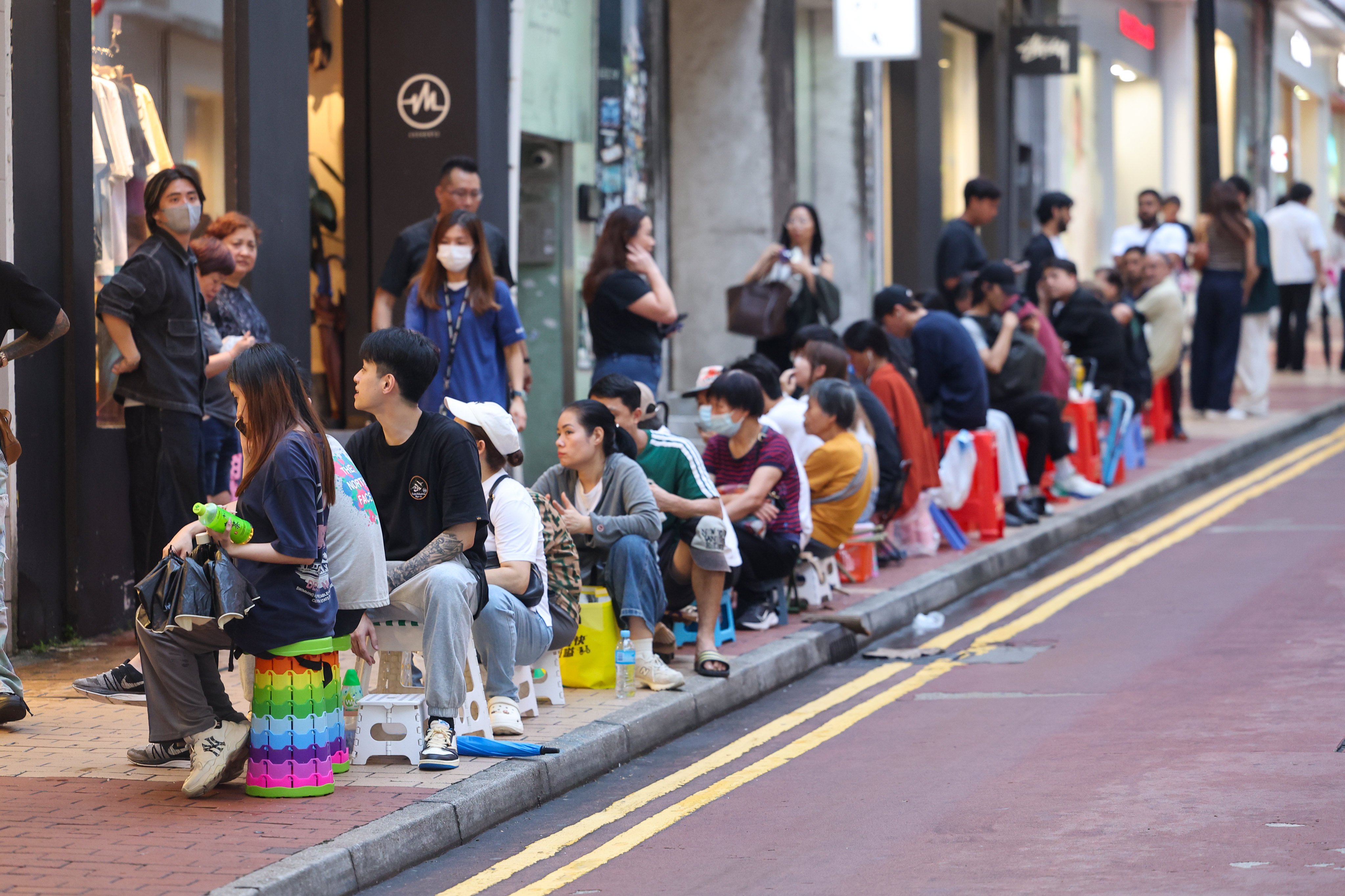 Several people interviewed by the SCMP said they planned to buy several watches, despite an official limit of one per customer per designated store each day. Photo: Edmond So
