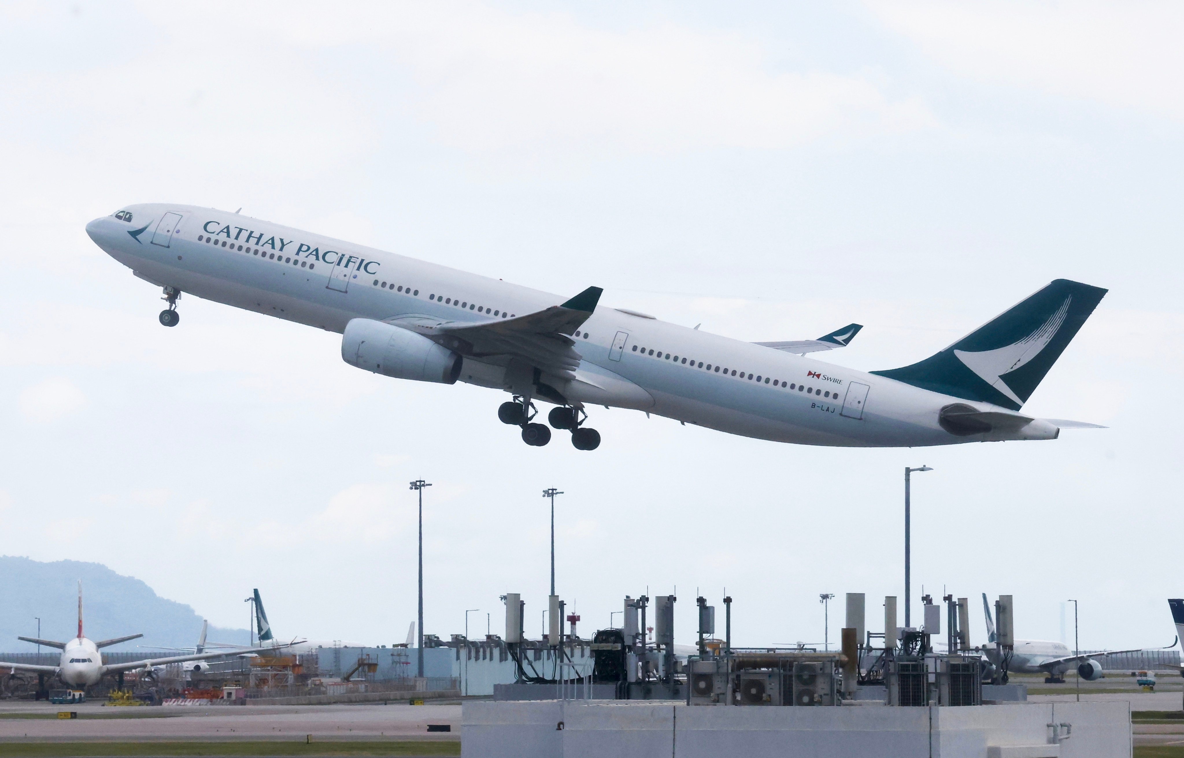 Cathay says late-arriving or no-show passengers are a key cause of delays, as safety regulations require removing their checked baggage from the aircraft hold before departure. Photo: Jonathan Wong