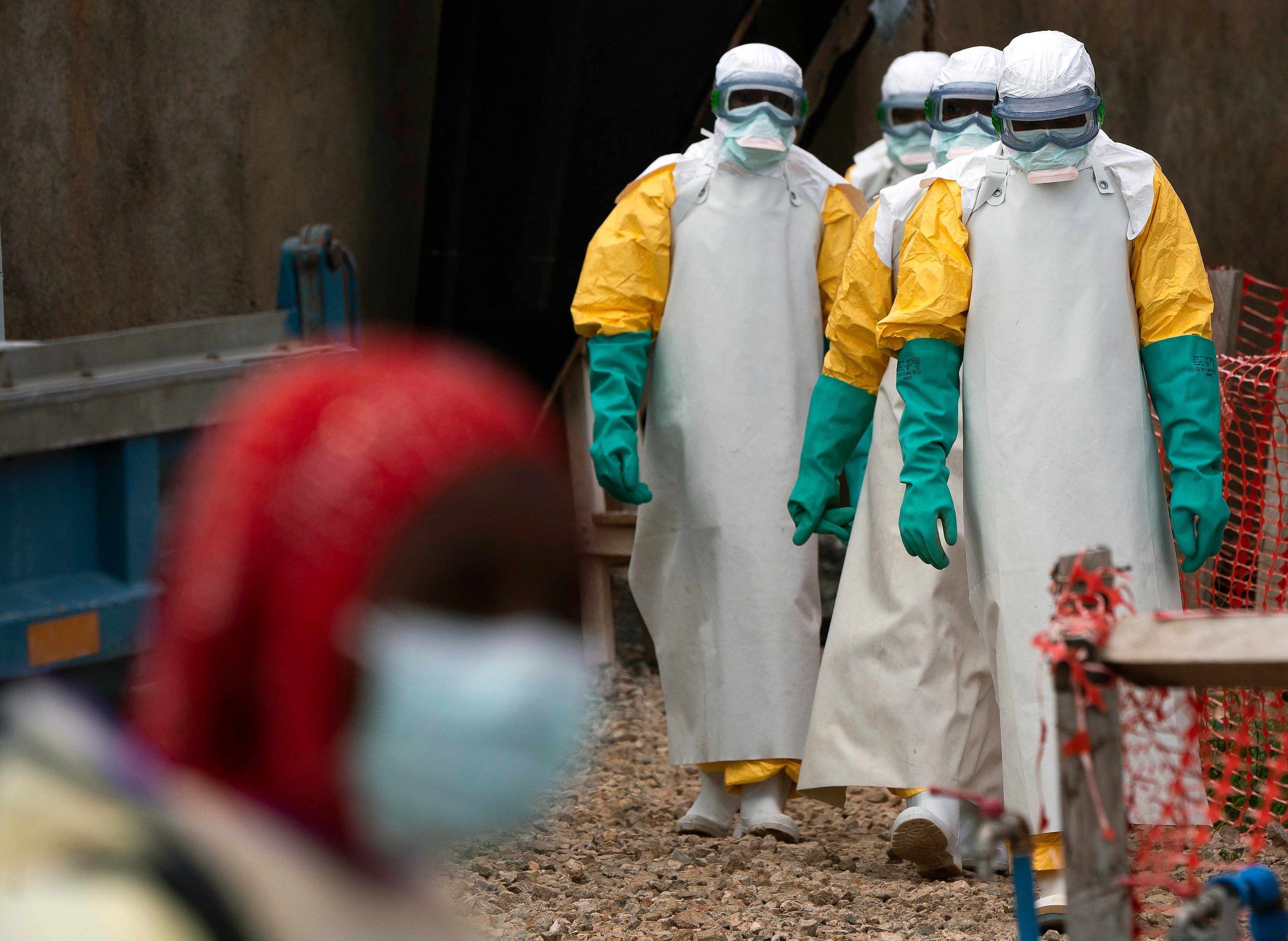 Health workers dressed in protective gear work at an Ebola treatment centre in Beni, Congo, in 2019. File photo: AP