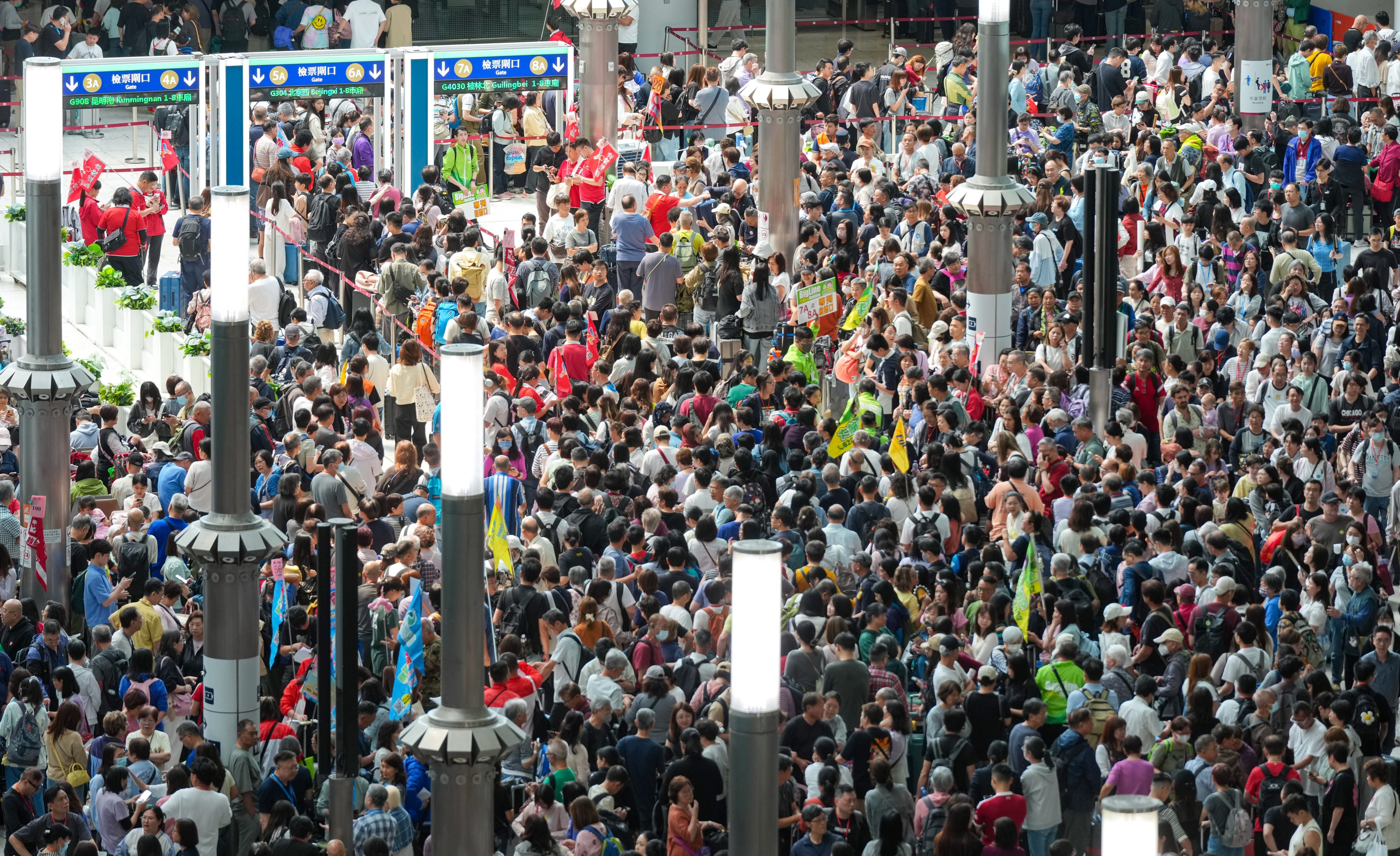 Crowds pack the West Kowloon rail terminus on the first day of Easter in April this year. Photo: Jelly Tse
