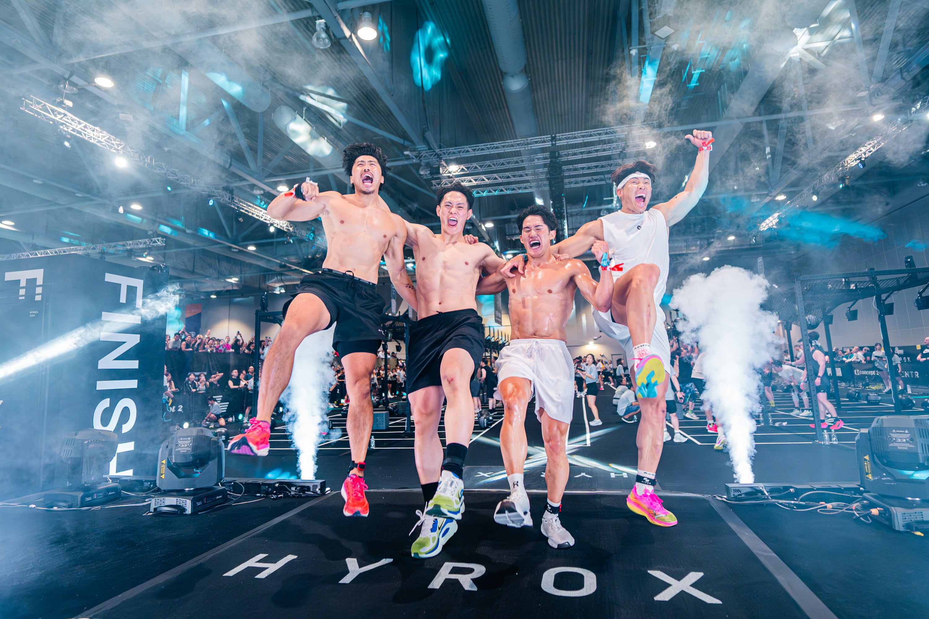 From left: Takashi Kurihara, Yuya Shozui, Atsushi Arai and Yoshio Itoi cross the finish line of the Team Relay Men’s event at Hyrox Hong Kong 2026. The Japanese team are known for their appearance on Netflix’s Final Draft. Photo: Handout
