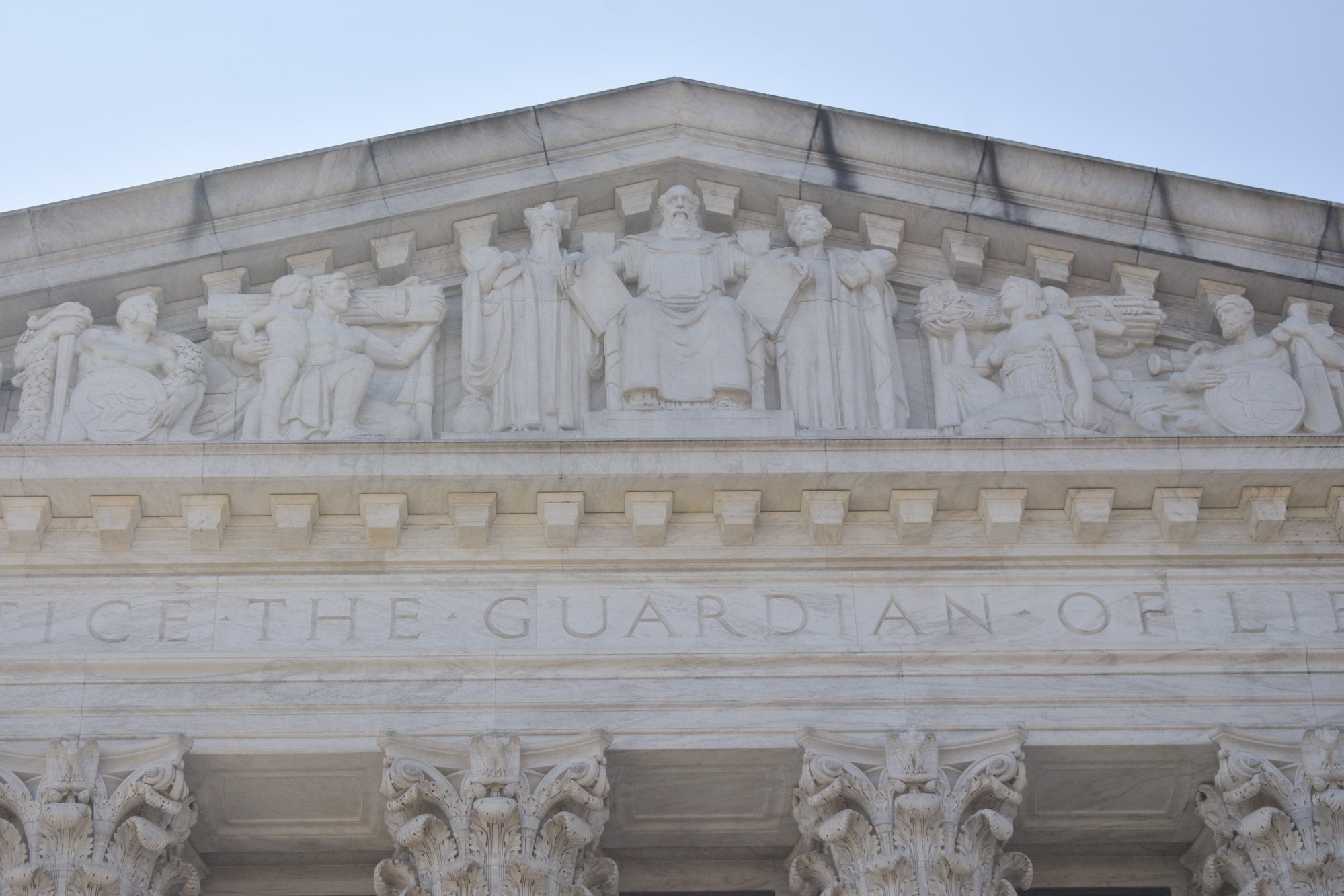 The eastern pediment of the United States Supreme Court building, where Confucius is depicted alongside Moses (centre) and Solon of Athens. Photo: Shutterstock