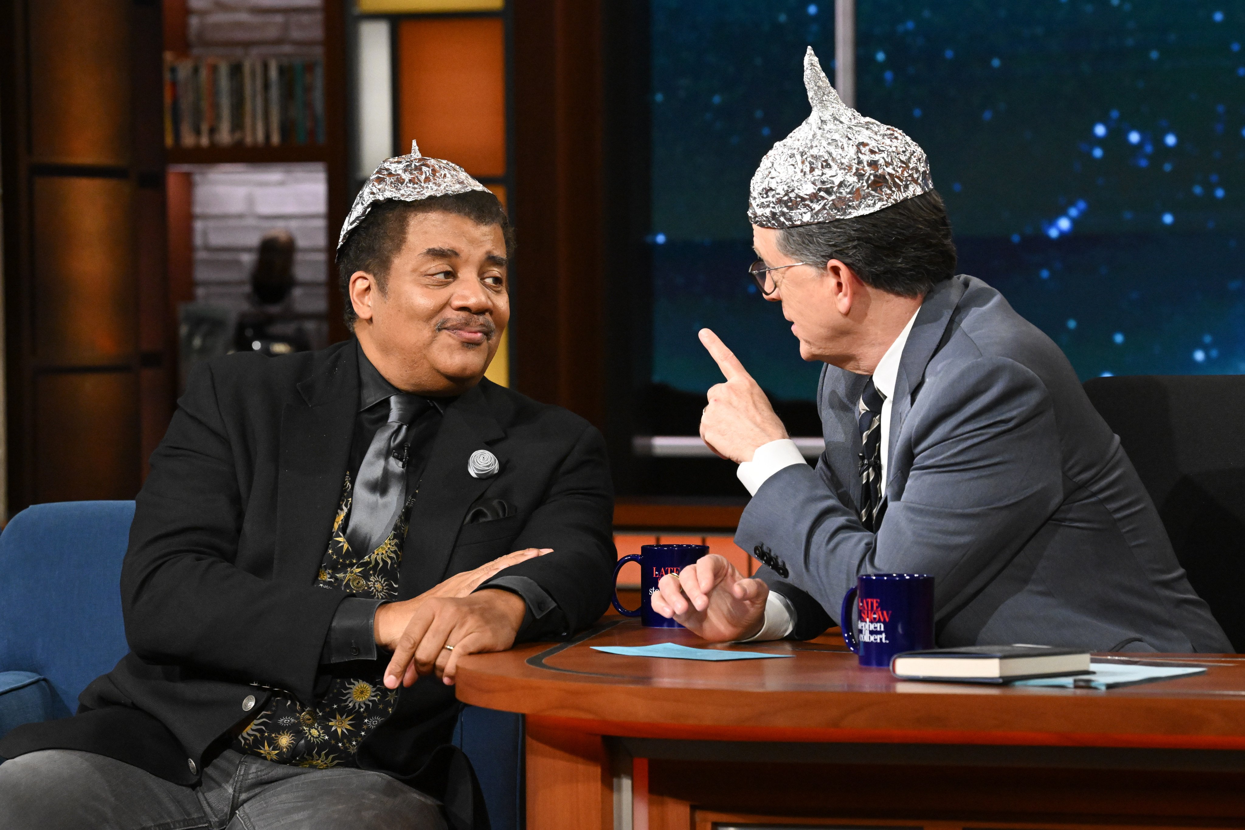 Neil deGrasse Tyson and Stephen Colbert appear on the CBS series The Late Show with Stephen Colbert on April 21, 2026. DeGrasse Tyson’s new book, Take Me To Your Leader, was released in May. Photo: CBS via Getty Images