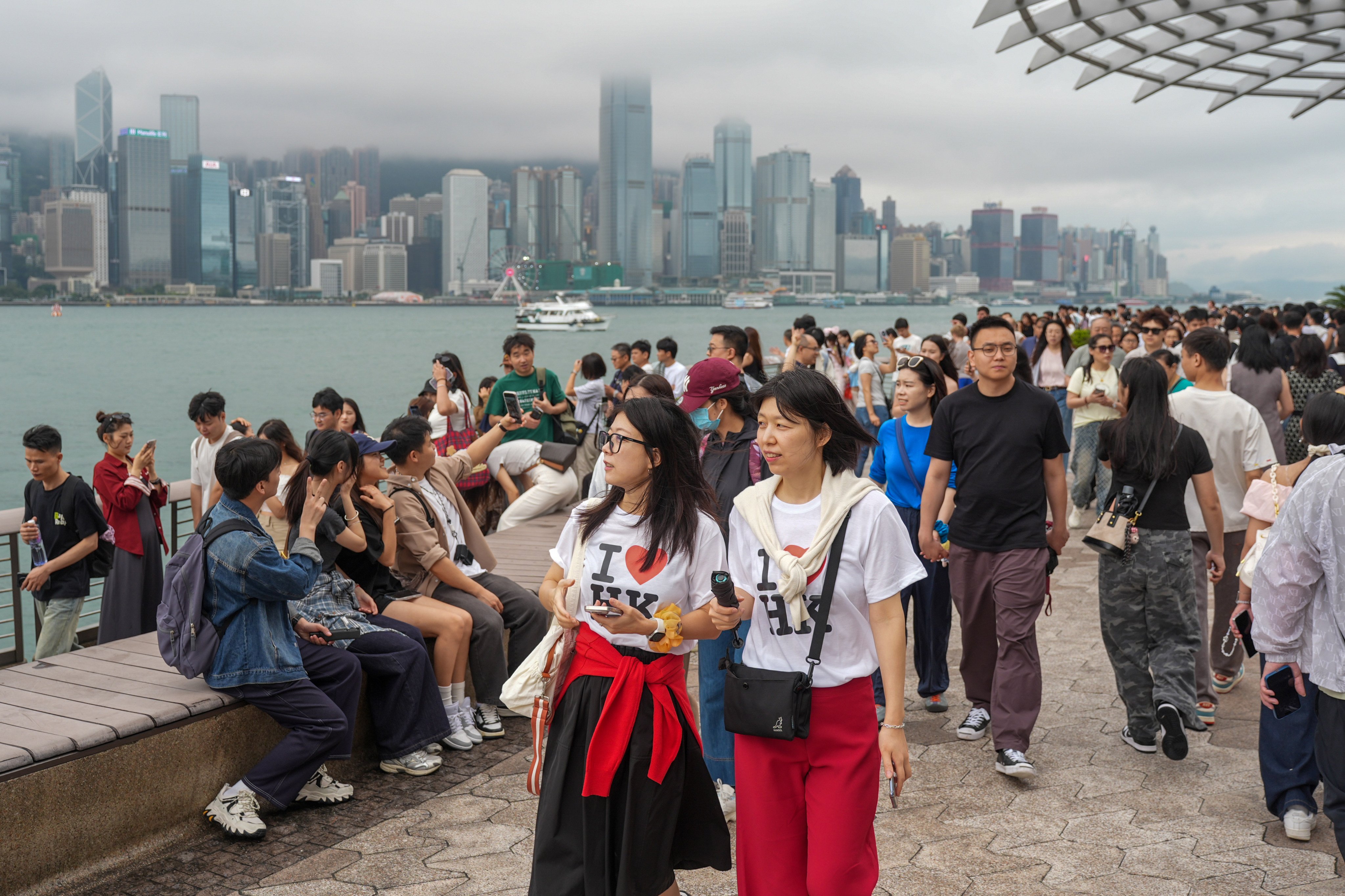 Tourists at the Tsim Sha Tsui waterfront during the Easter holiday in April. Photo: Eugene Lee