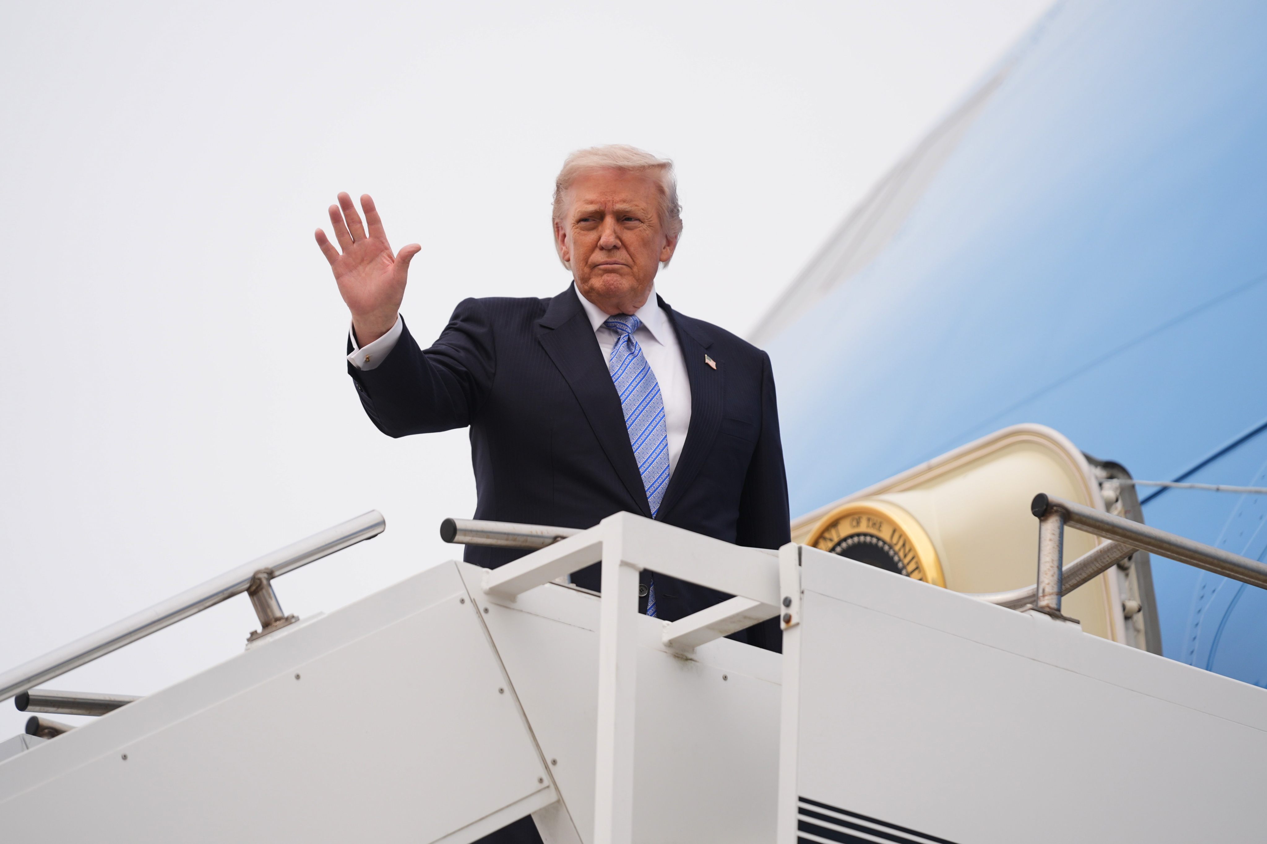 US President Donald Trump boards Air Force One on Friday. Photo: AP