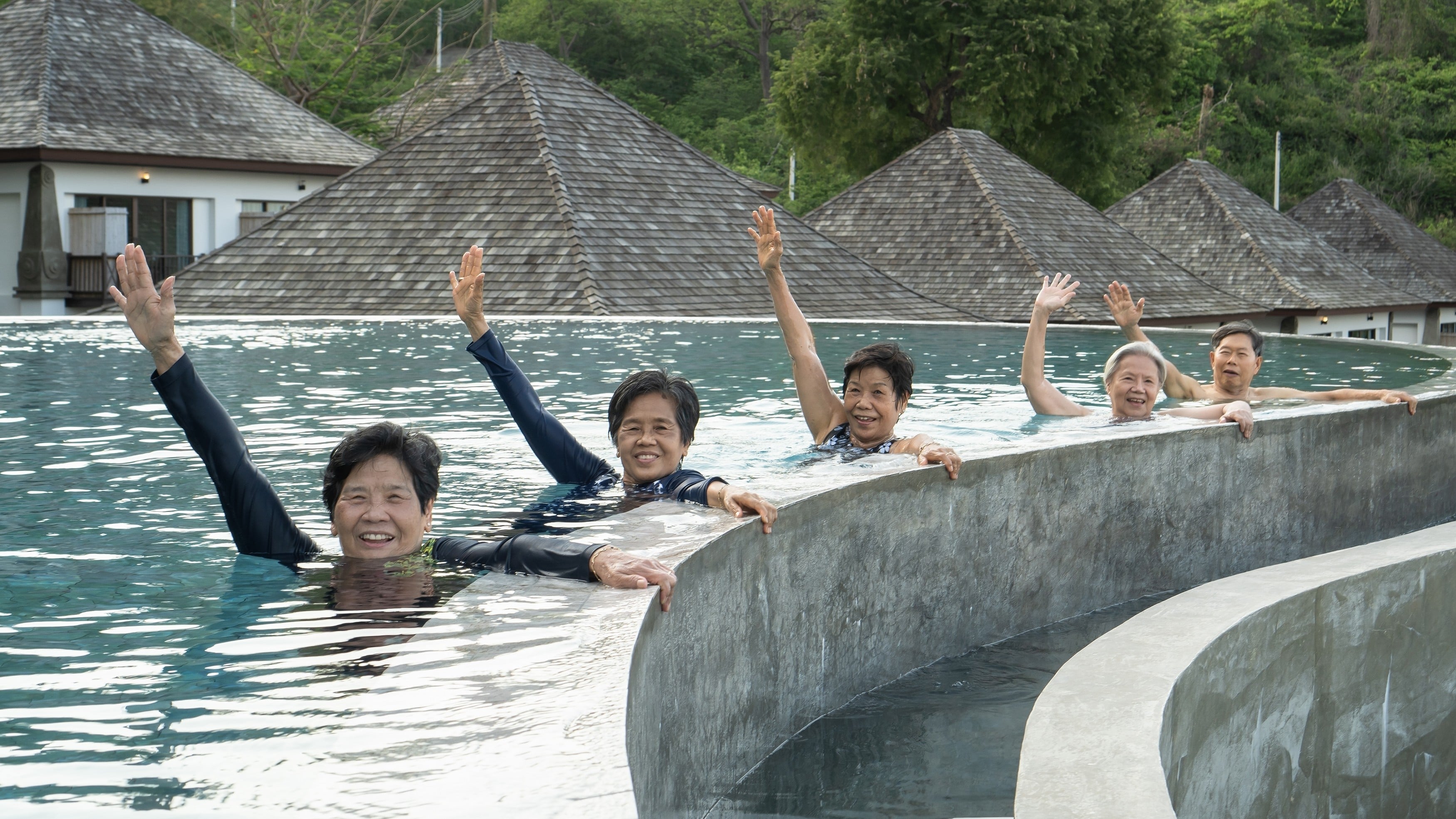 A Harvard University study found that people with higher optimism scores were less likely to develop dementia. One way to become more optimistic is to surround yourself with like-minded people. Photo: Shutterstock