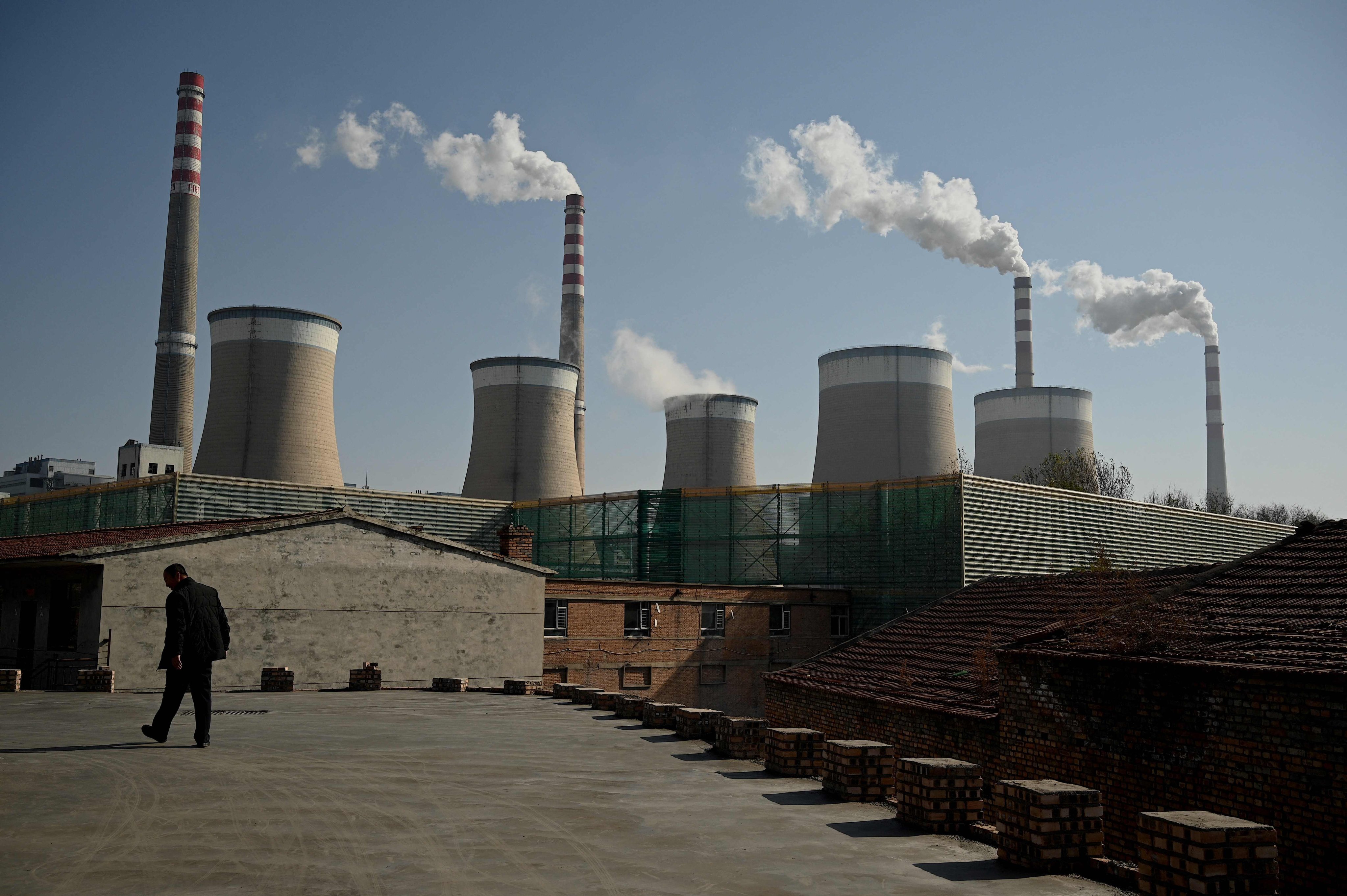 A coal-powered power plant belches smoke in Datong, central China’s Shanxi province, on November 4, 2021. Reportedly, Jiangnan Environmental Technology's process can capture about 90 per cent of the carbon emitted by a power plant. Photo: AFP