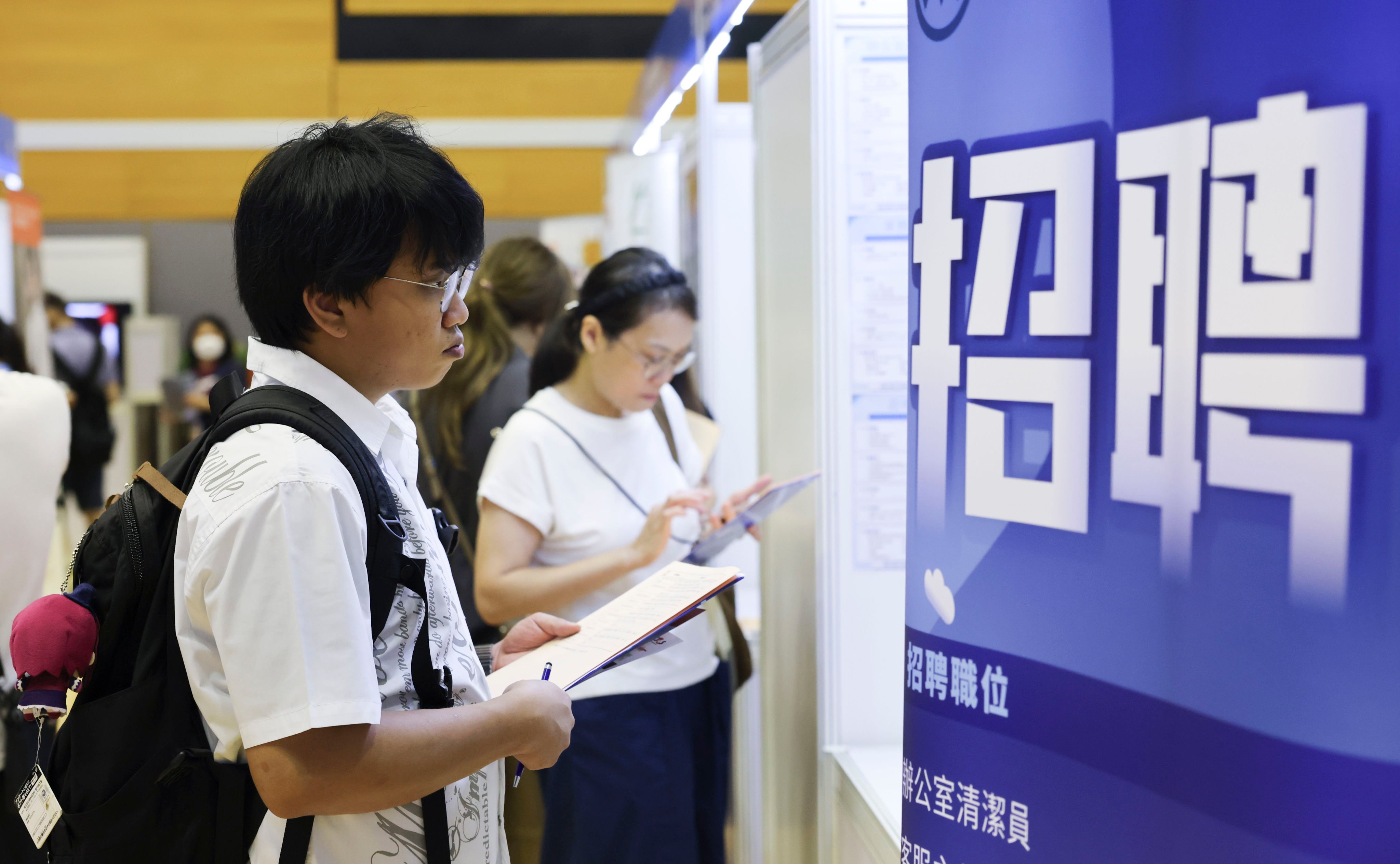 Jobseekers attend a career fair at the Tin Ching Community Hall in Tin Shui Wai. Photo: Nora Tam