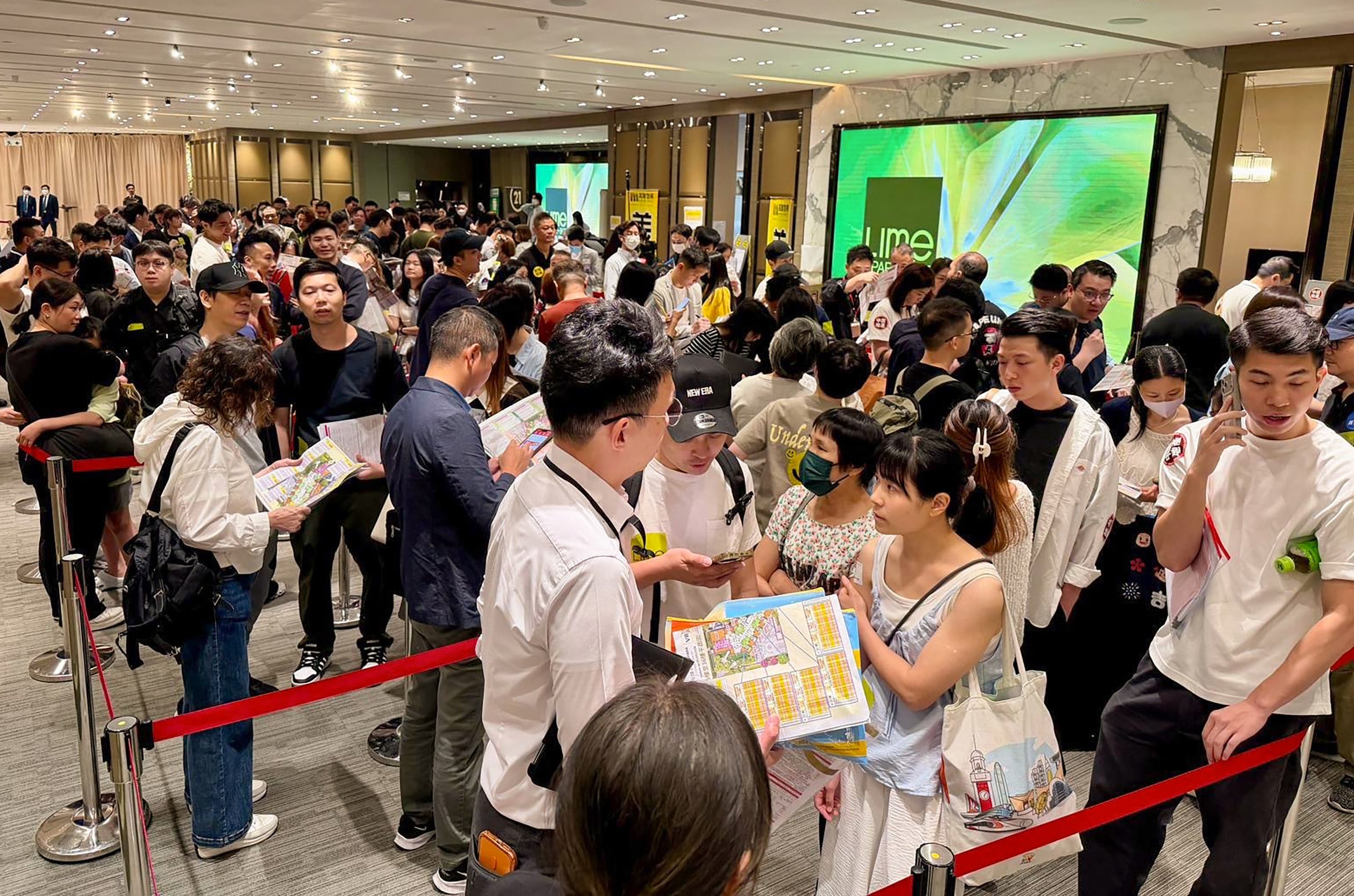 Buyers flocked to the SHKP sales office on Saturday for flats at the Lime Spark project in Tsuen Wan. Photo: Handout
