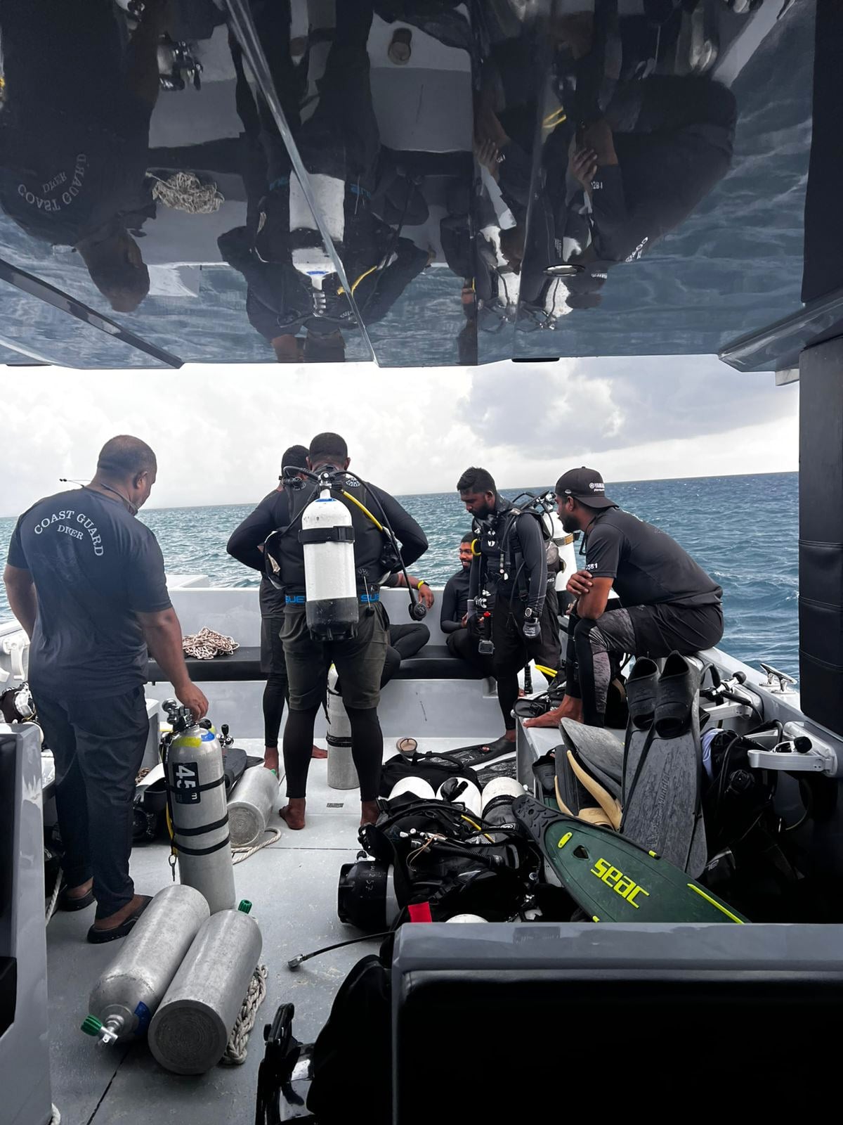 Rescue divers preparing to search for the four missing Italian divers near Alimathaa Island, Vaavu Atoll, Maldives, on Saturday. Photo: AP