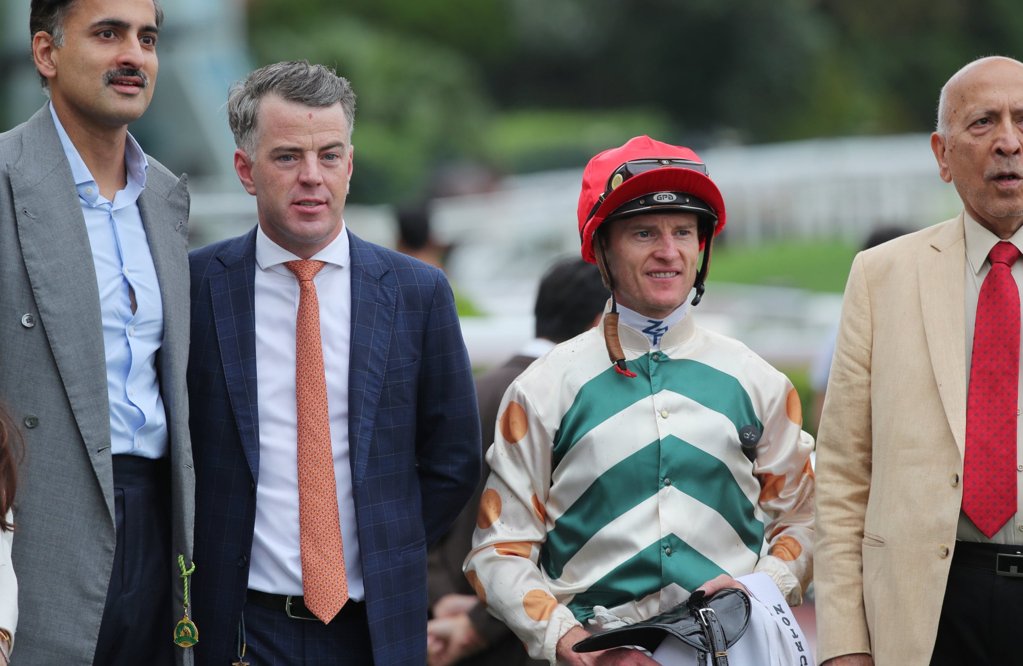 Connections celebrate the win of Lahore at Sha Tin. Connections celebrate the win of Lahore at Sha Tin.
