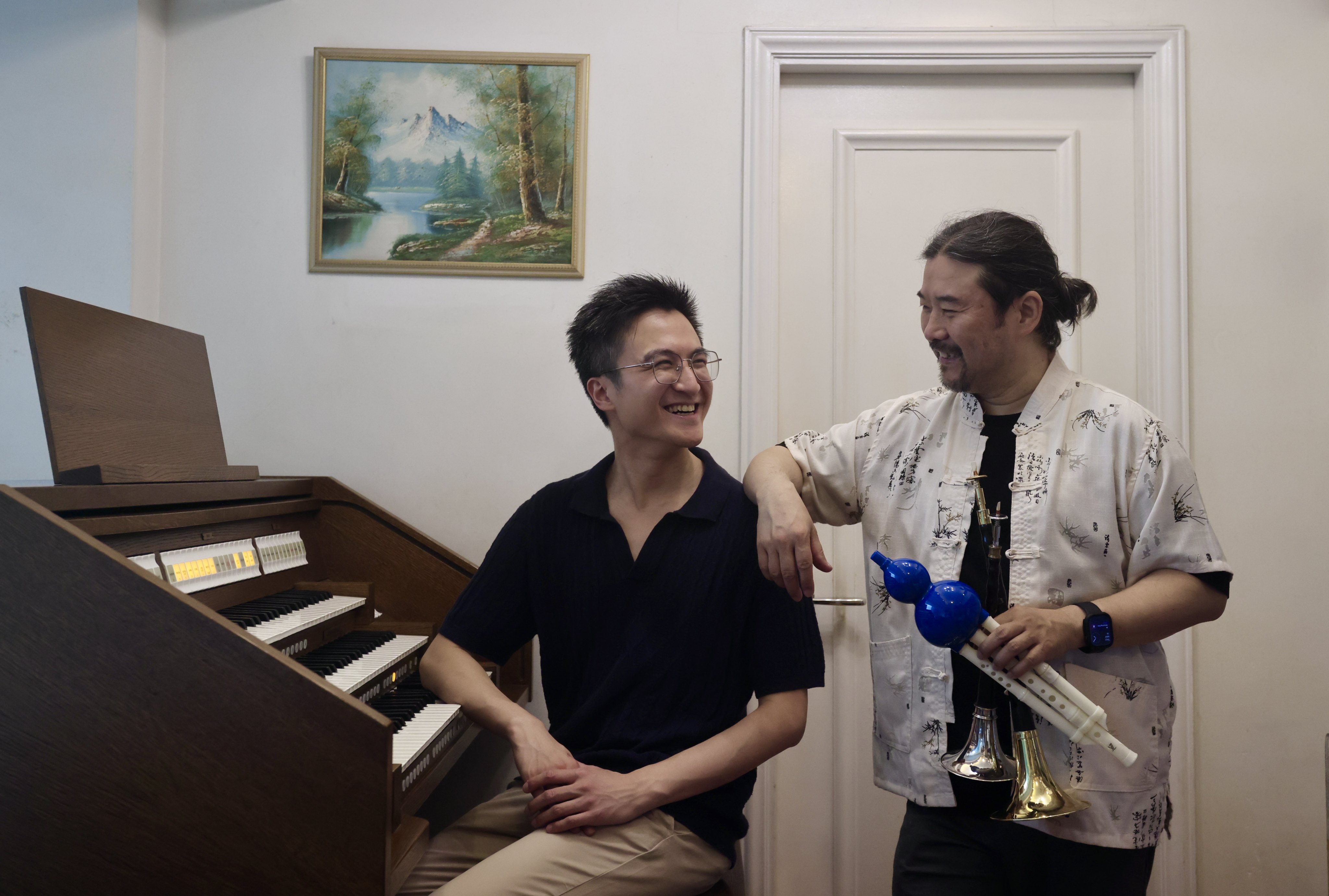 Organist Eric Chan (left) and suona player Guo Yazhi, in Lai Chi Kok, Hong Kong, in May 2026. For his latest cross-cultural project, Chan is bridging the East and West by marrying the pipe organ with the suona in concert. Photo: Jonathan Wong